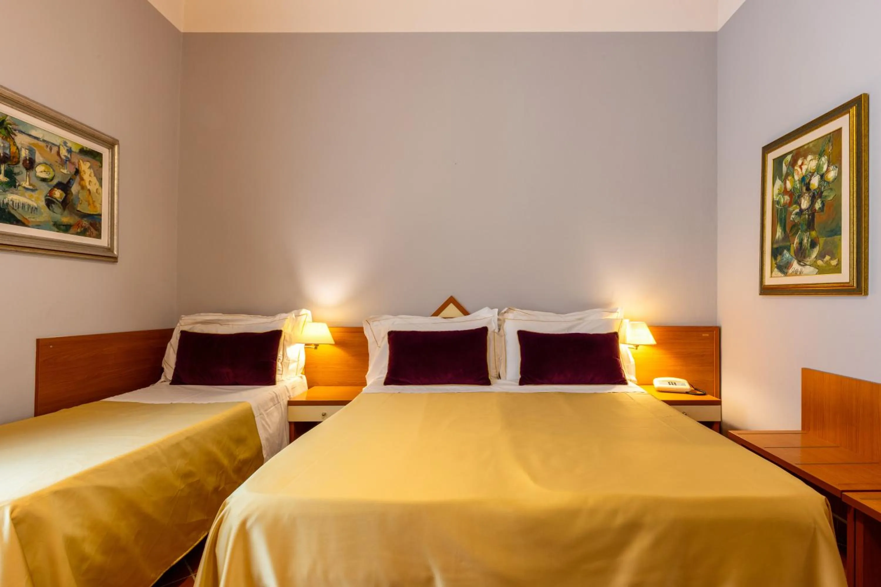 Bed in Hotel Maxim Axial