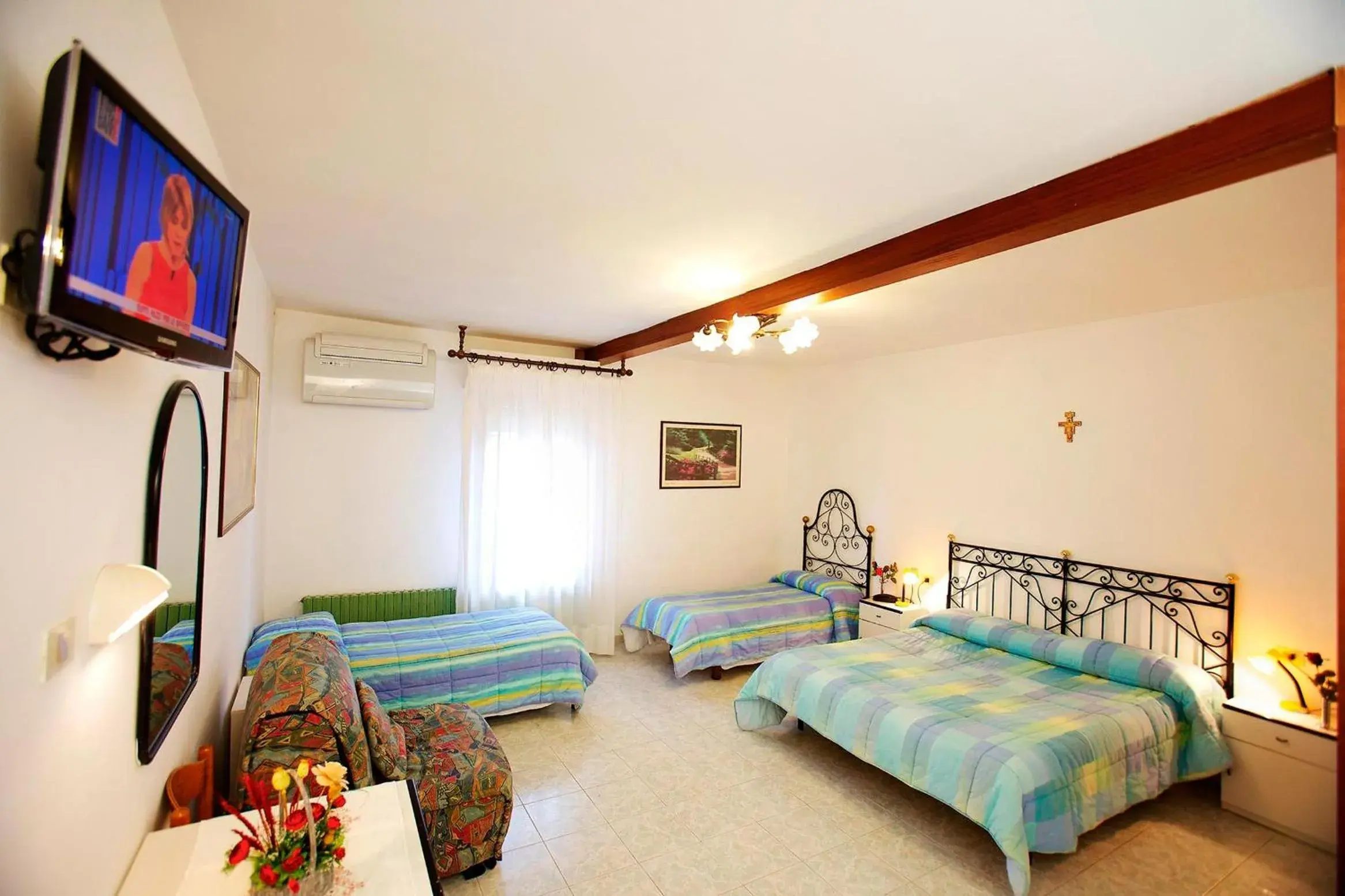 Quadruple Room in Hotel Da Angelo Quadruple Room in Hotel Da Angelo