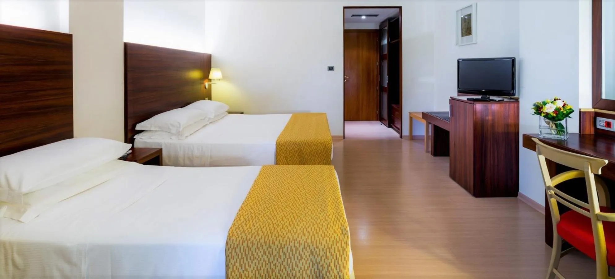 Bed in Delfina Palace Hotel