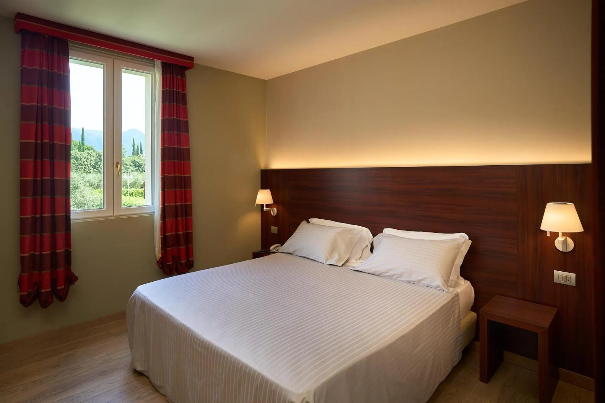 Bed in Delfina Palace Hotel