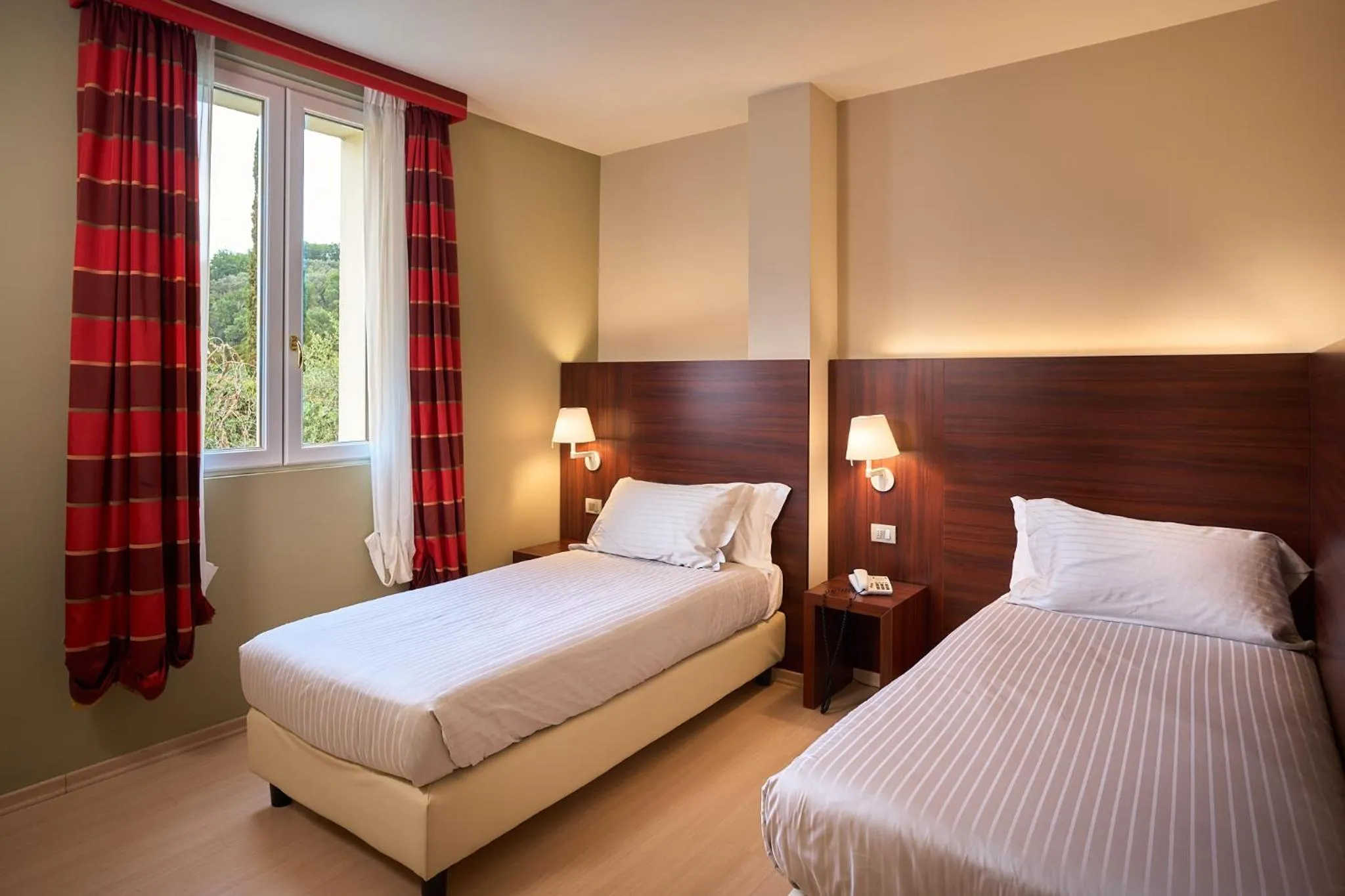 Bed in Delfina Palace Hotel