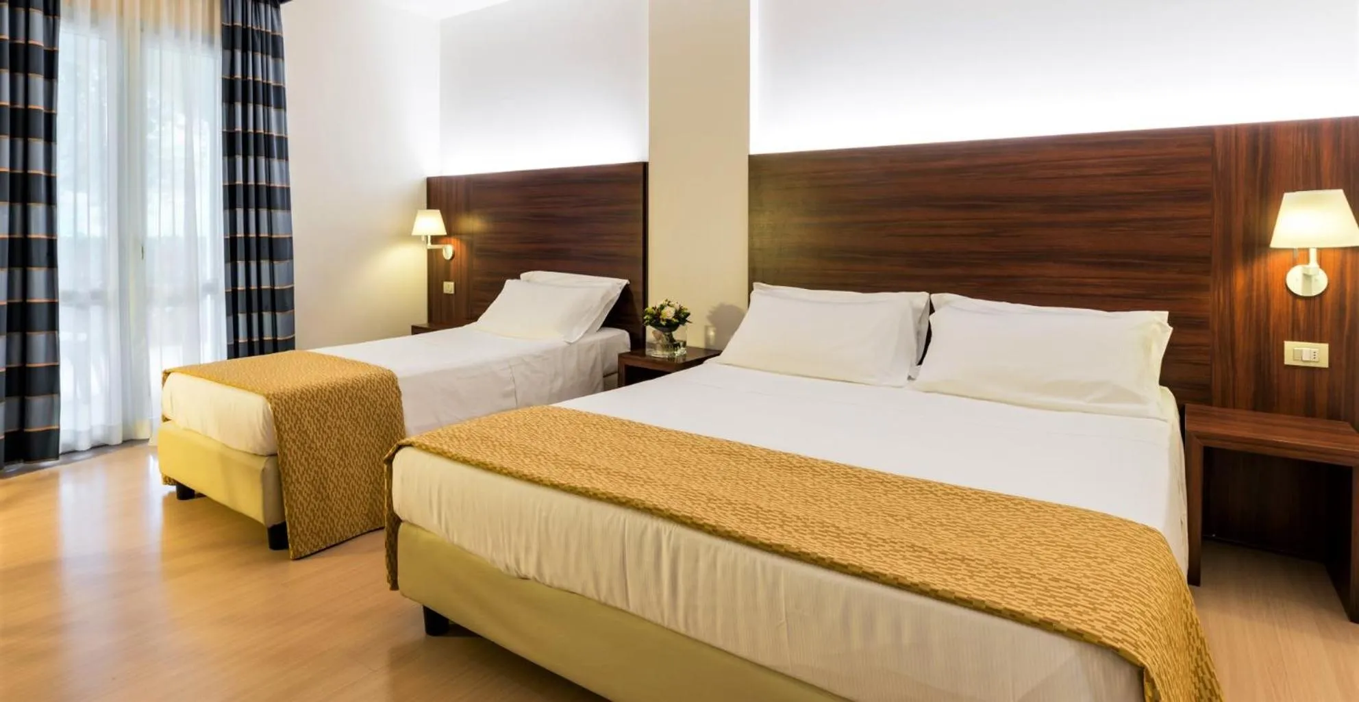 Bed in Delfina Palace Hotel