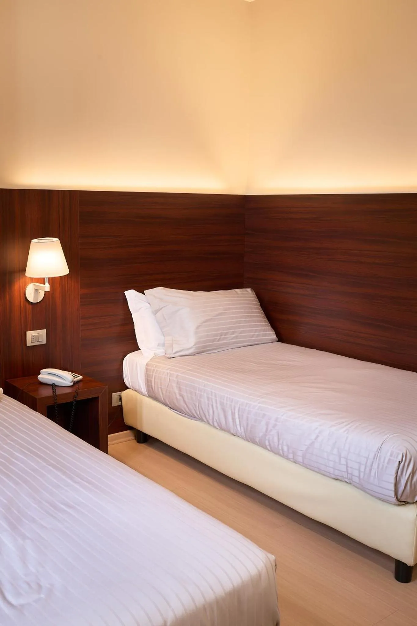 Bed in Delfina Palace Hotel