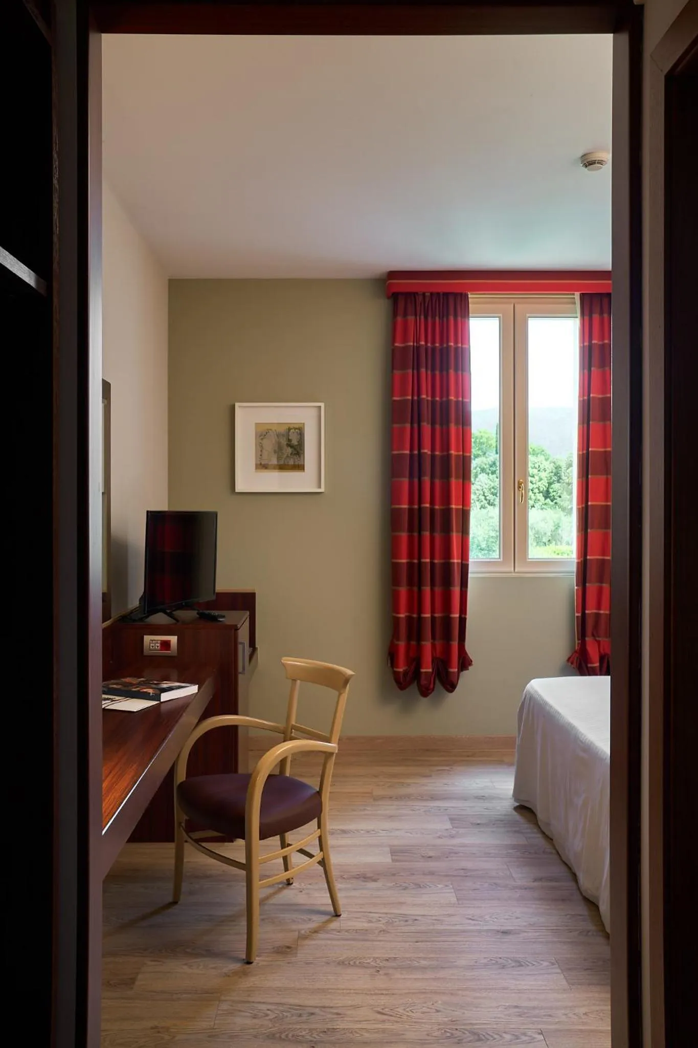 Bed in Delfina Palace Hotel