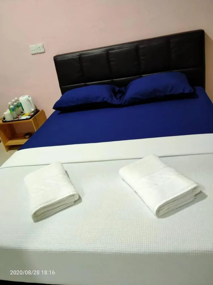 Bed in TAMIM SUITE GROUP HOTEL Dungun