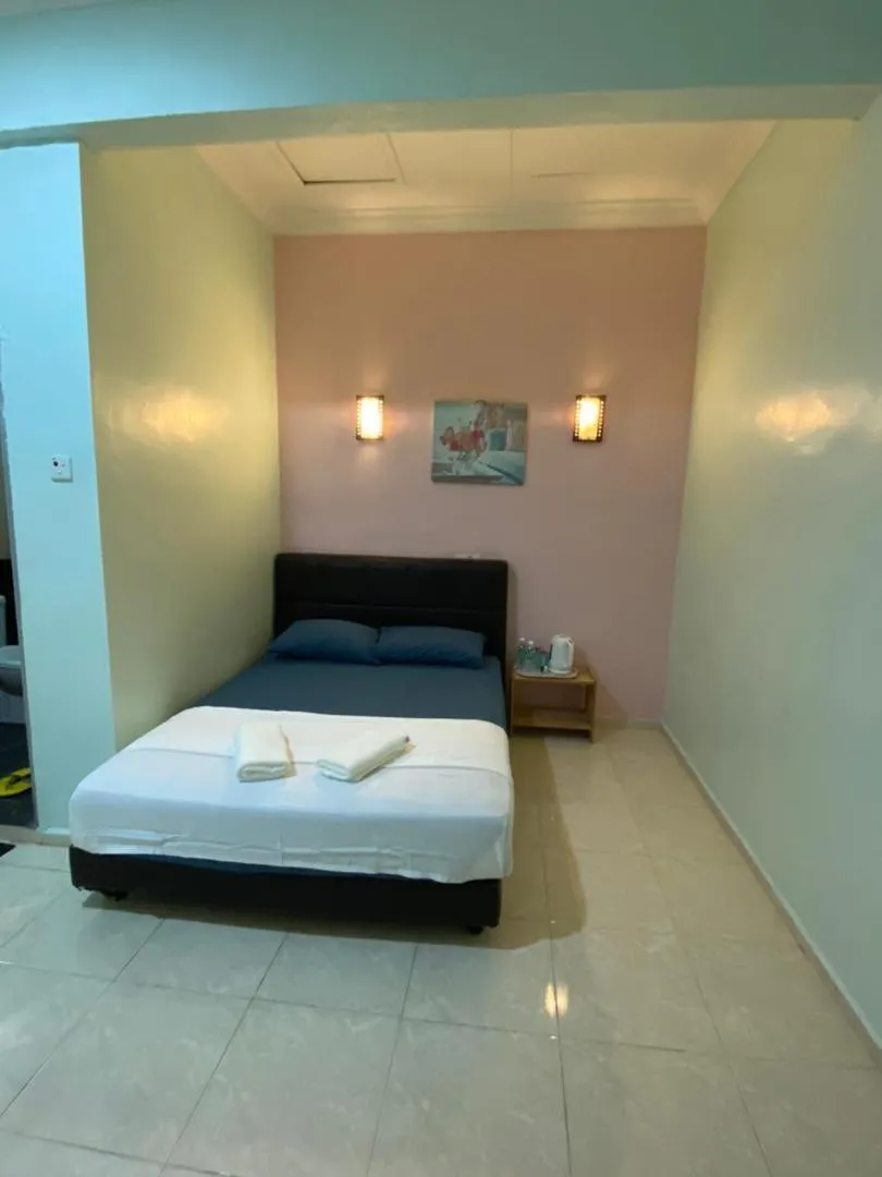 Bed in TAMIM SUITE GROUP HOTEL Dungun