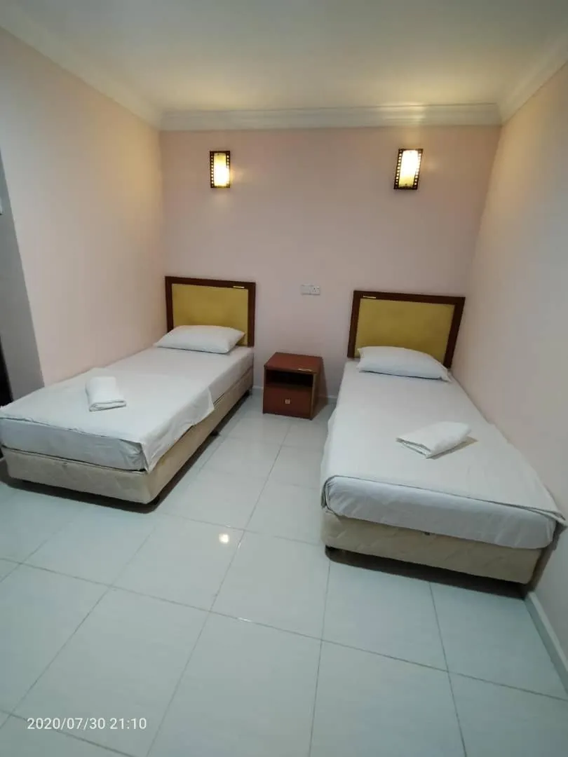 Bed in TAMIM SUITE GROUP HOTEL Dungun