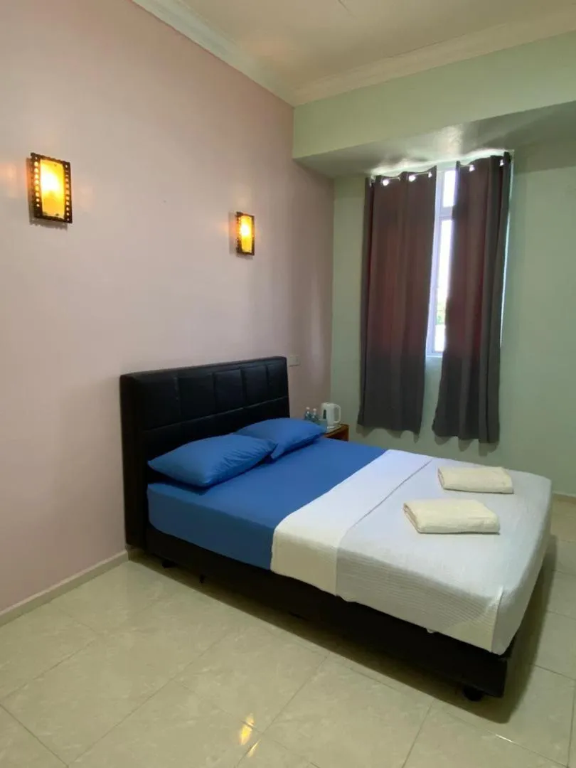 Bed in TAMIM SUITE GROUP HOTEL Dungun