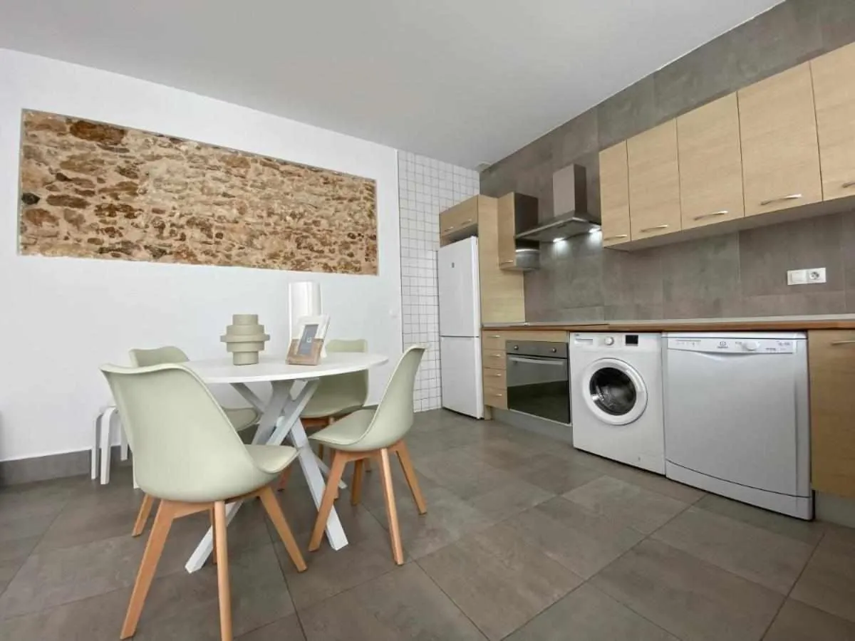 Kitchen or kitchenette in Apartamentos Casa Macías