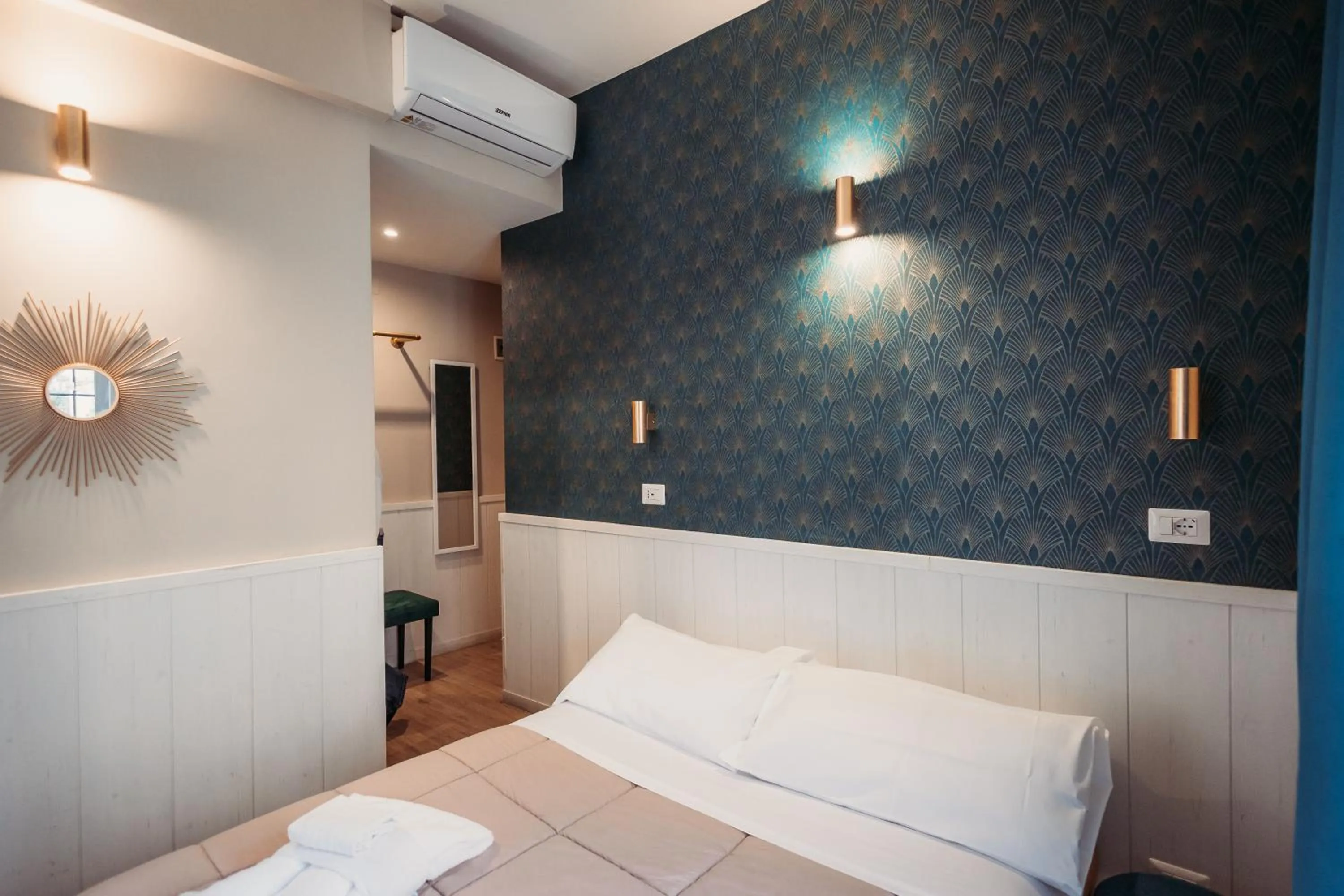 Bed in Hotel Domus Tiberina