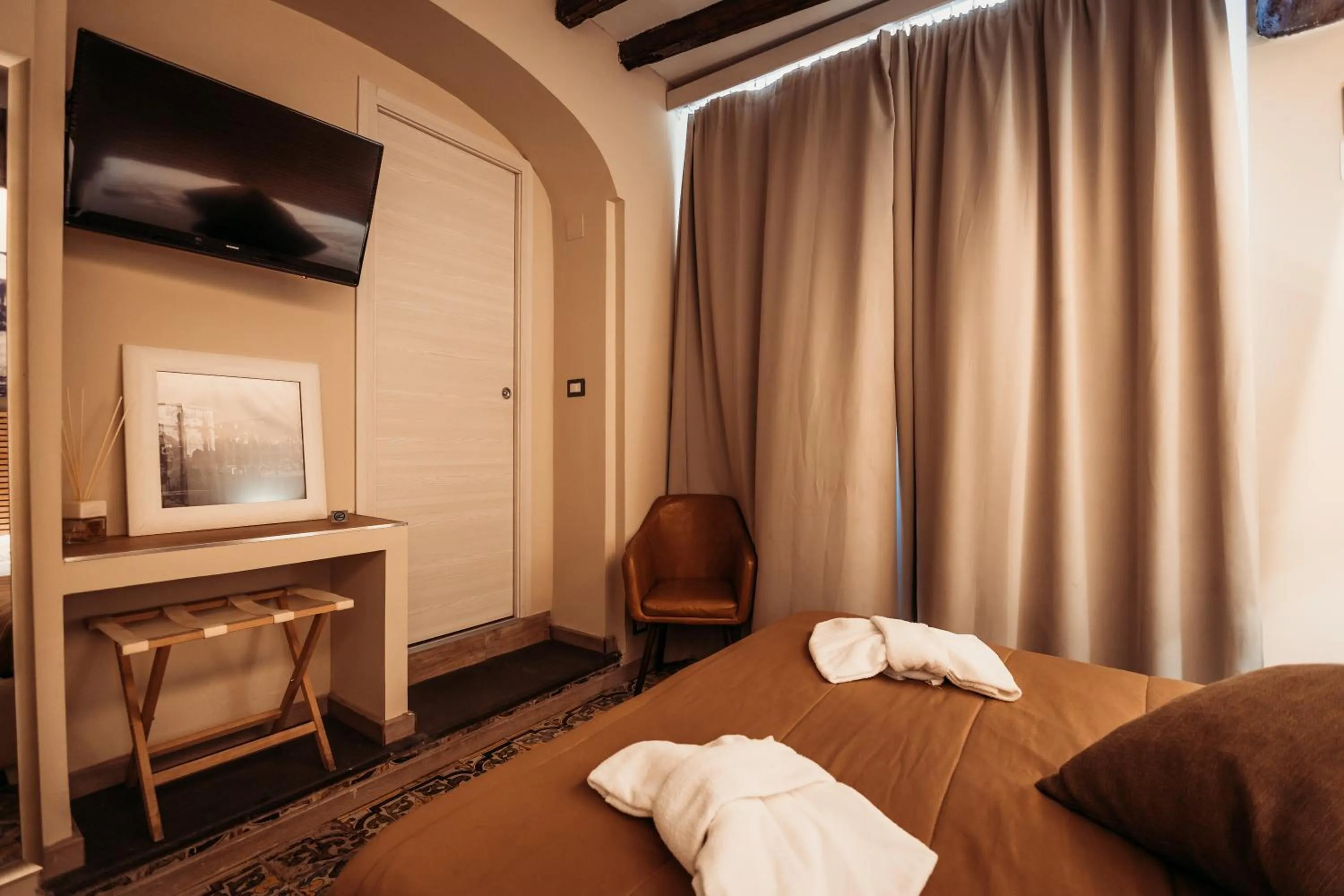 Bed in Hotel Domus Tiberina