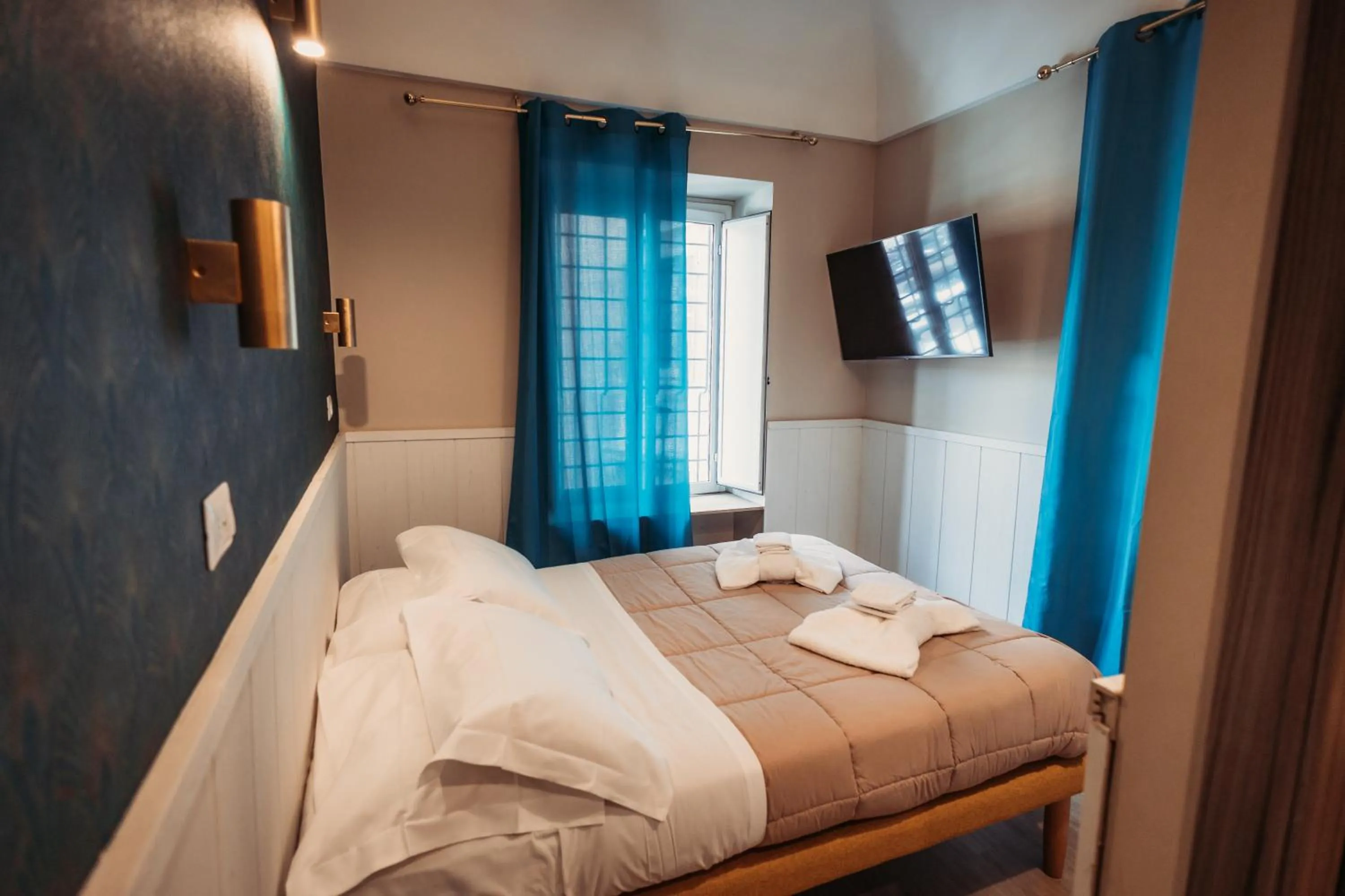 Bed in Hotel Domus Tiberina