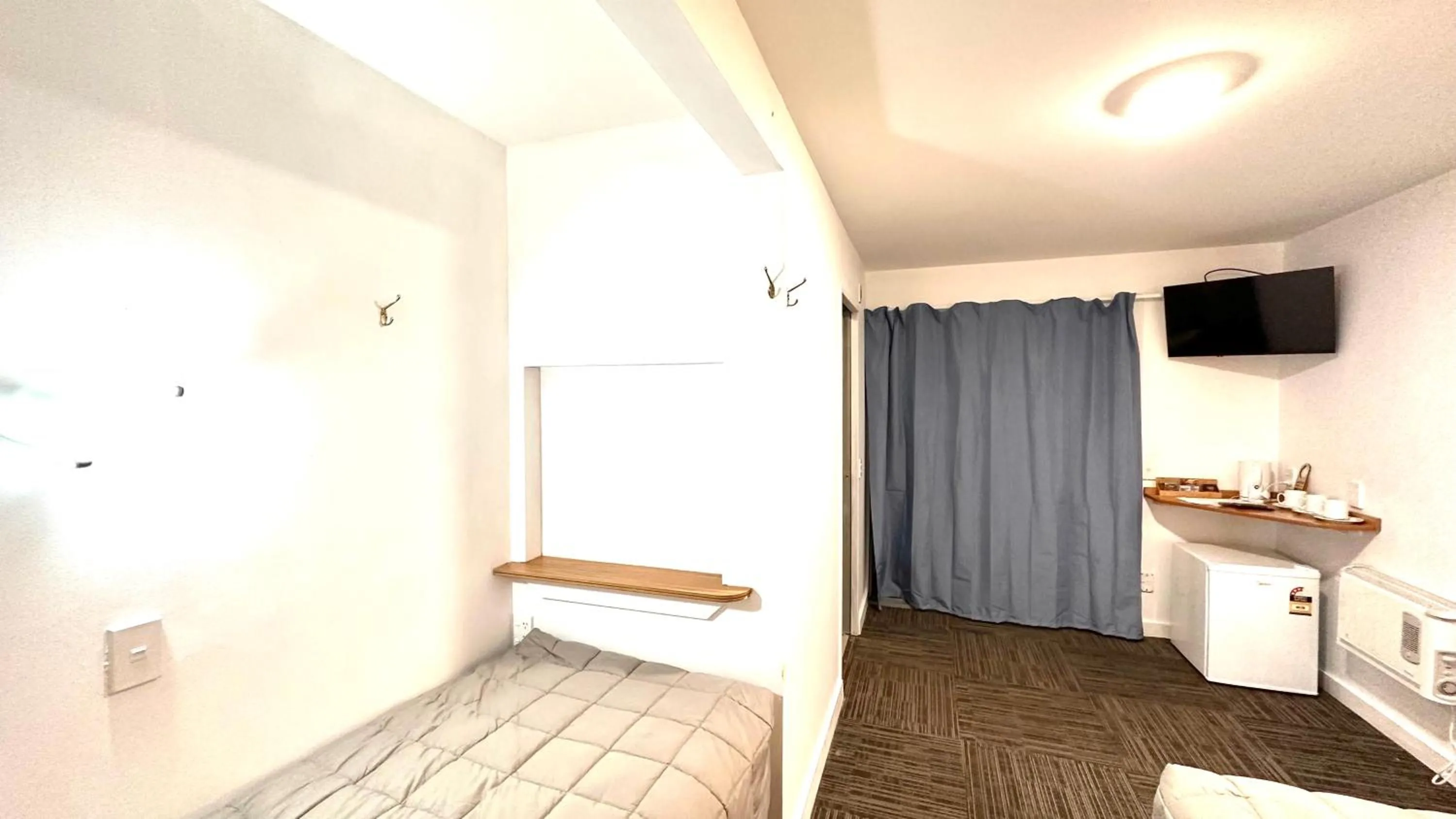 Bed in Fox Glacier Jade Hotel