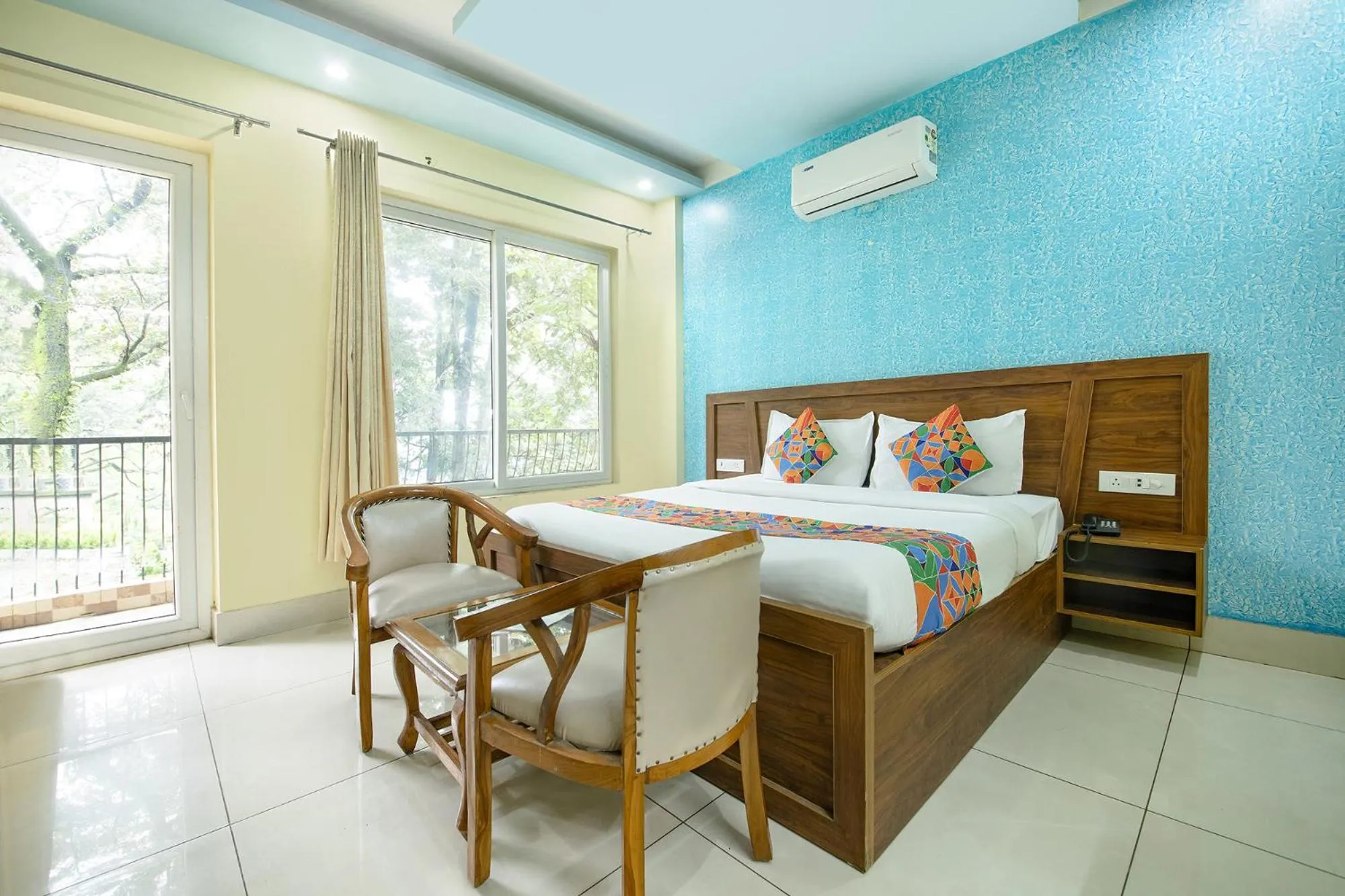 Bed in FabHotel Crestwood Inn