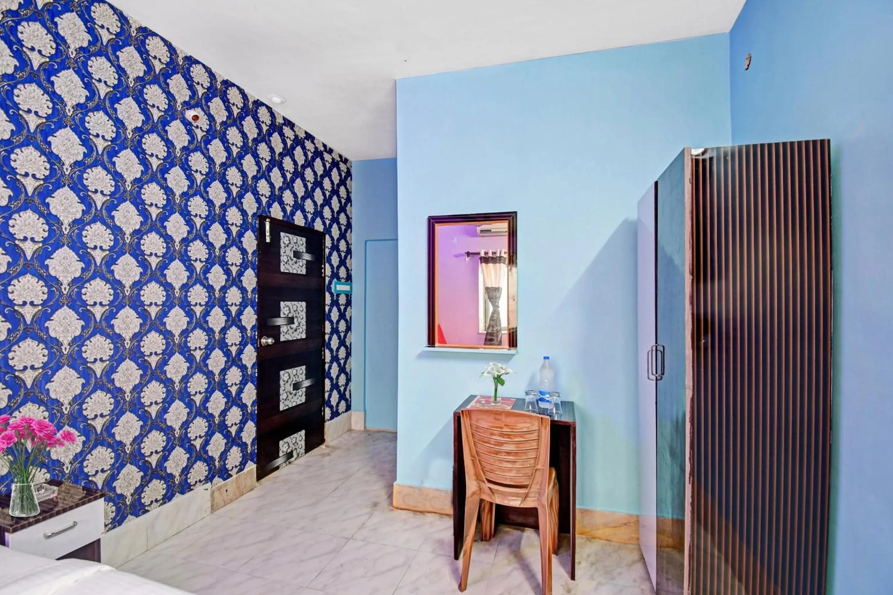 Bedroom in Hotel O Ankan Regency Near Acropolis Mall