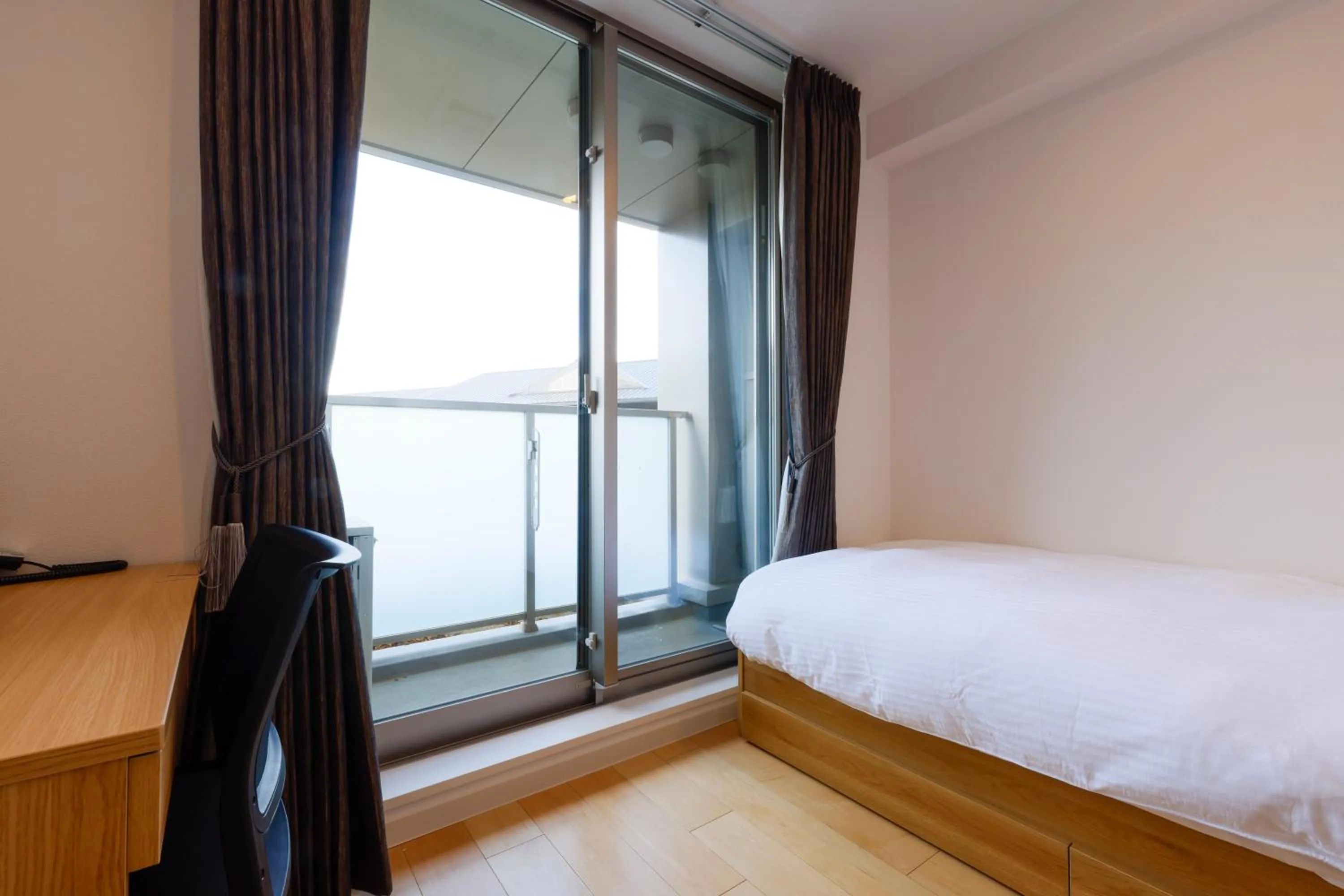 Bed in Hotel Nara Sakurai No Sato