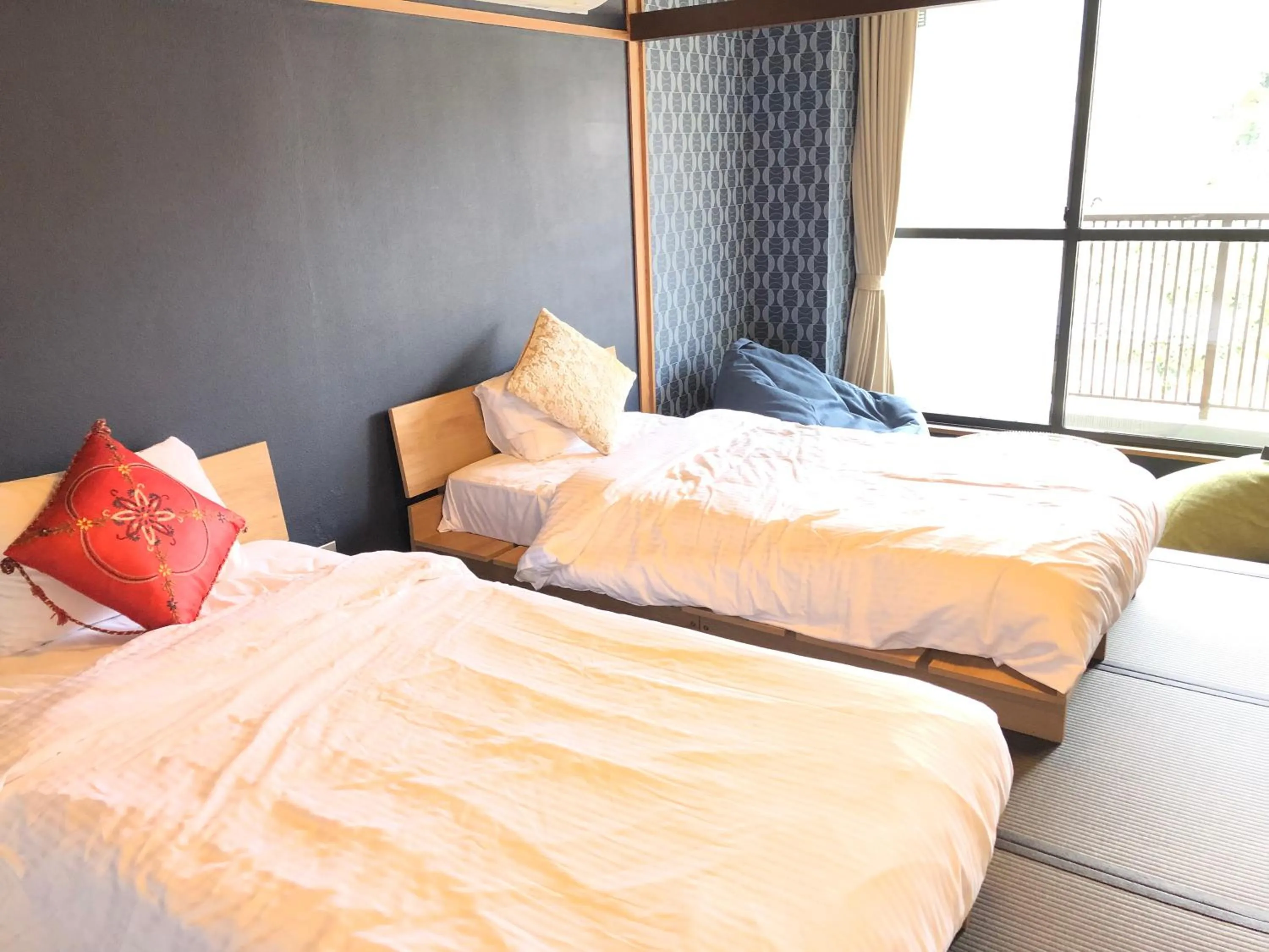 Photo of the whole room, Bed in ISOLA Izukogen