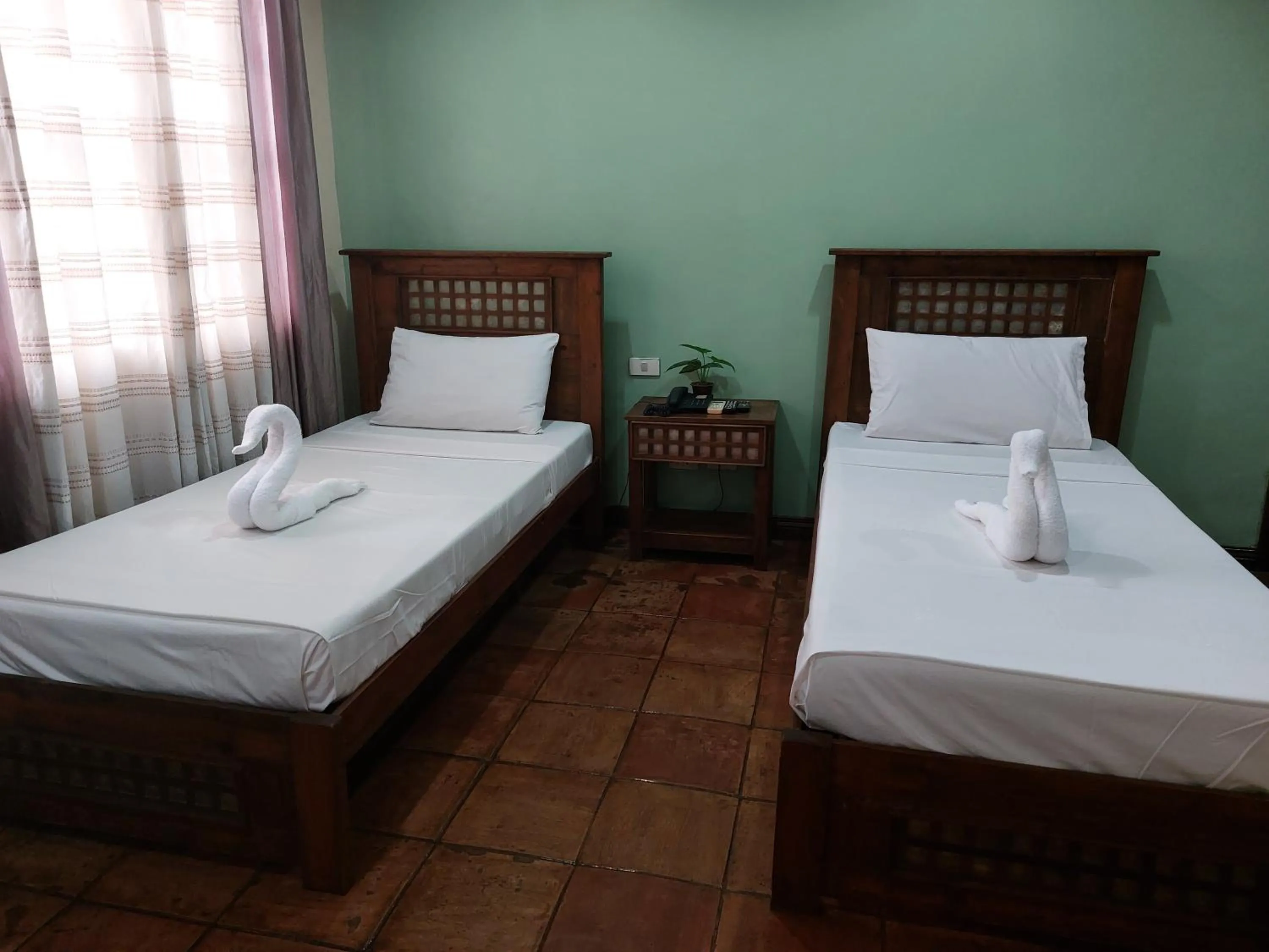 Bed in Makabata Guesthouse & Cafe