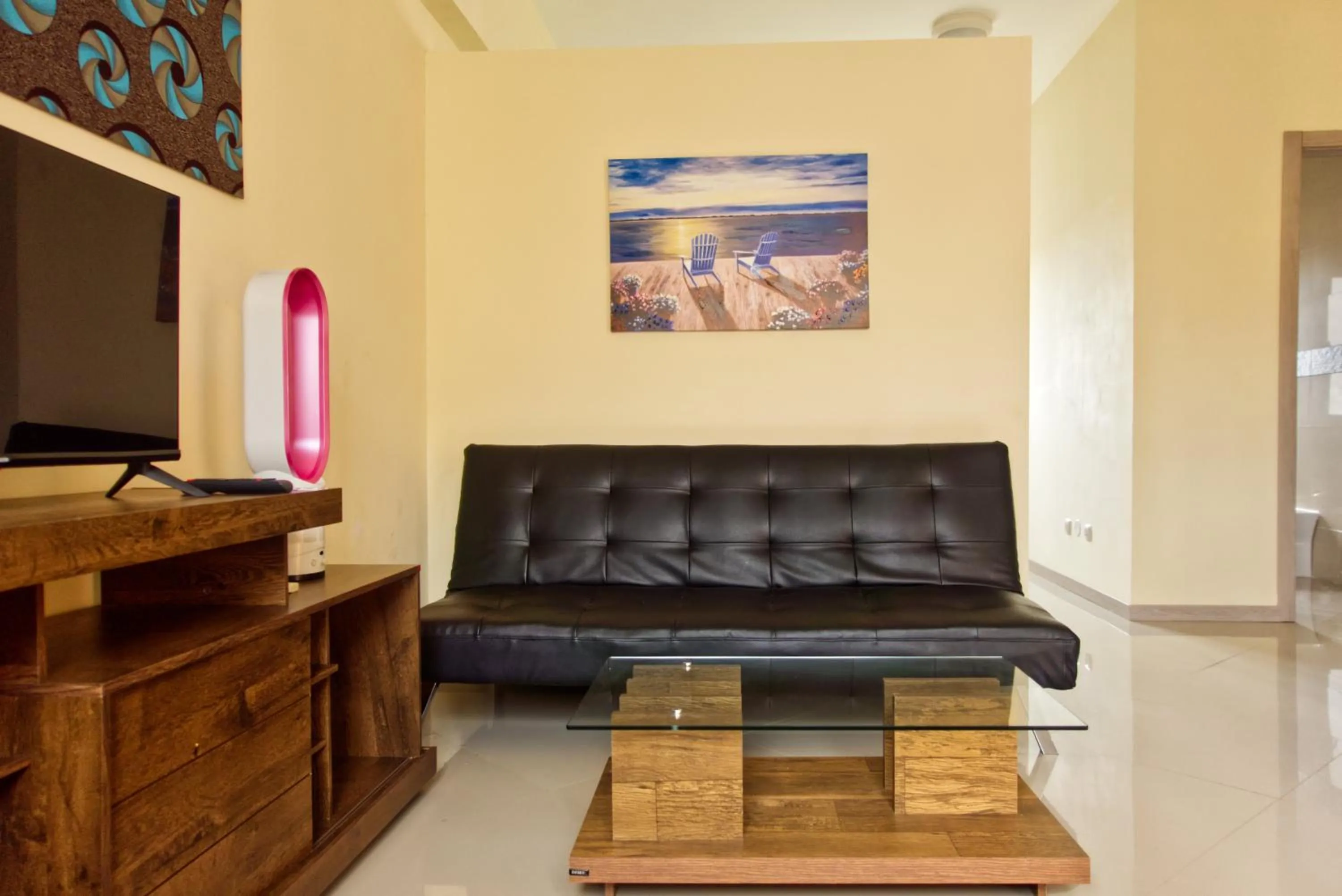 Communal lounge/ TV room in Praia Capital Residence Aparthotel