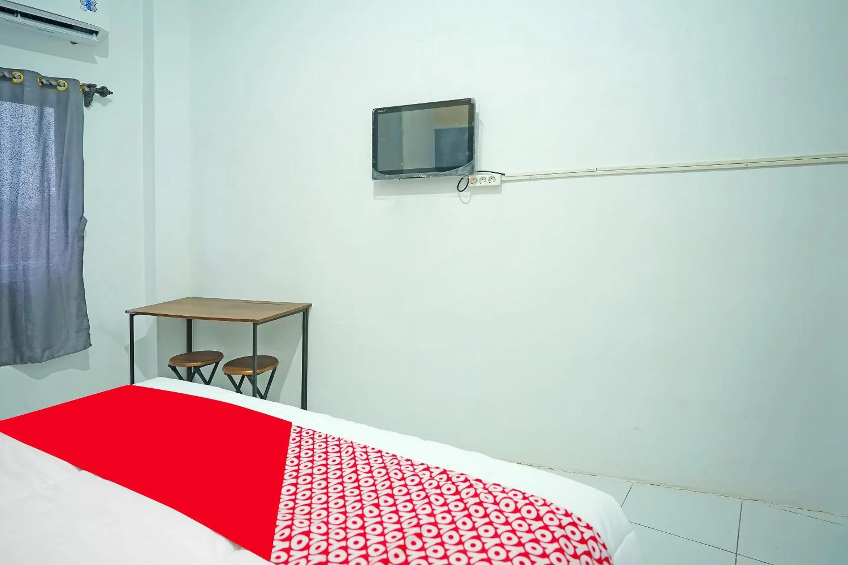 Bedroom in Hotel O Kost Bangau Syariah