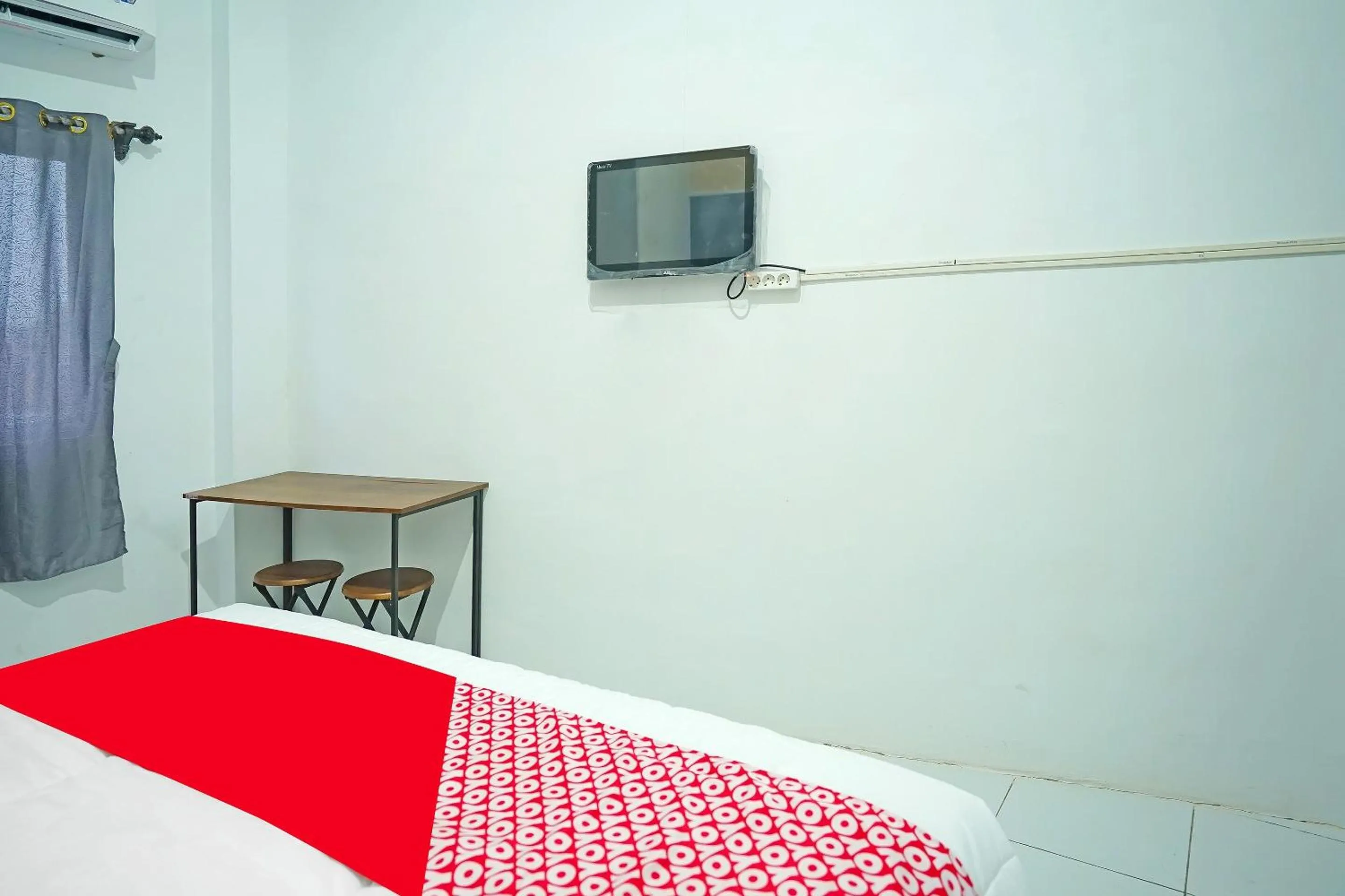 Bedroom in Hotel O Kost Bangau Syariah