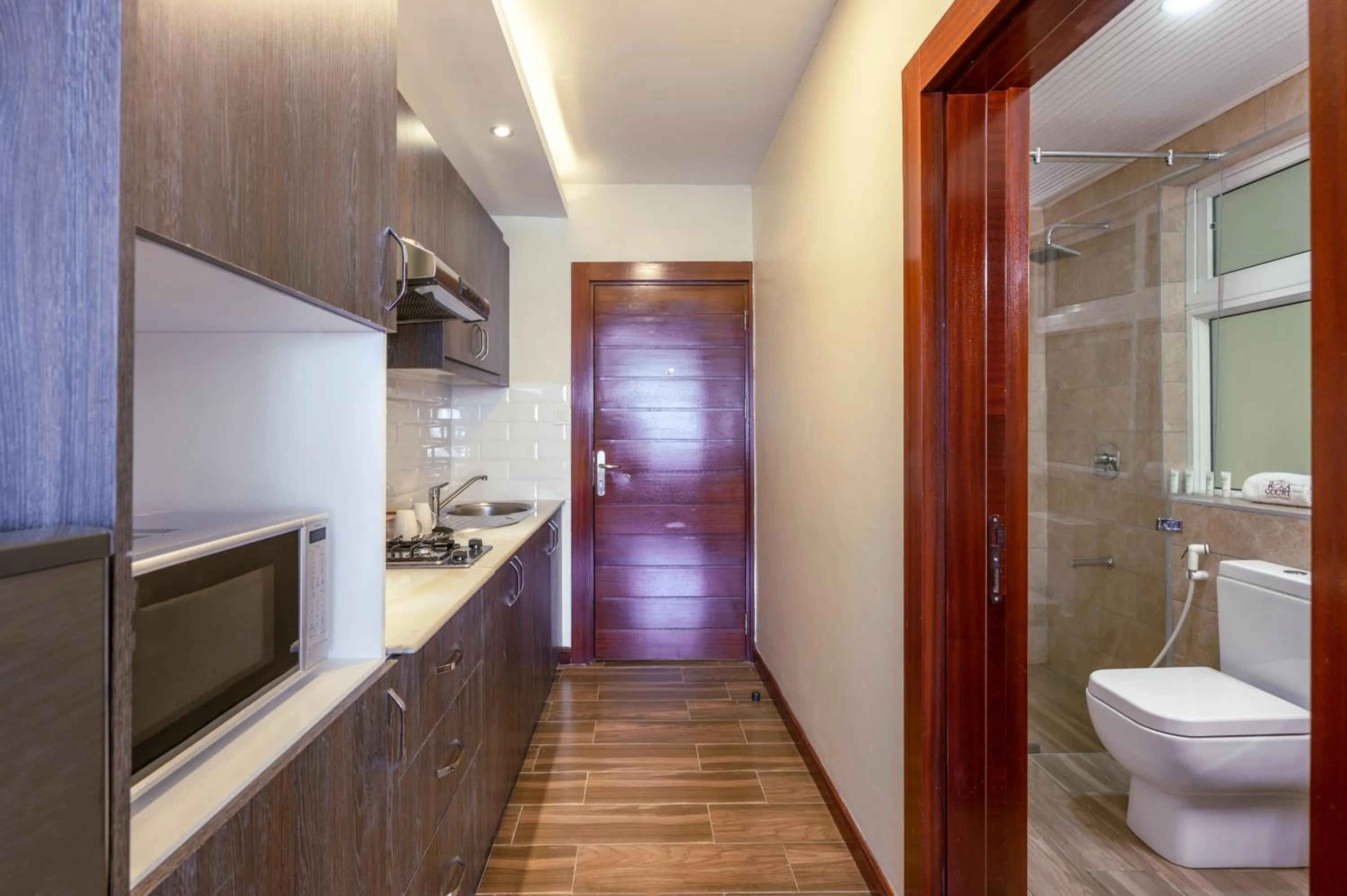 Kitchen or kitchenette in Roma Court Serviced Apartments