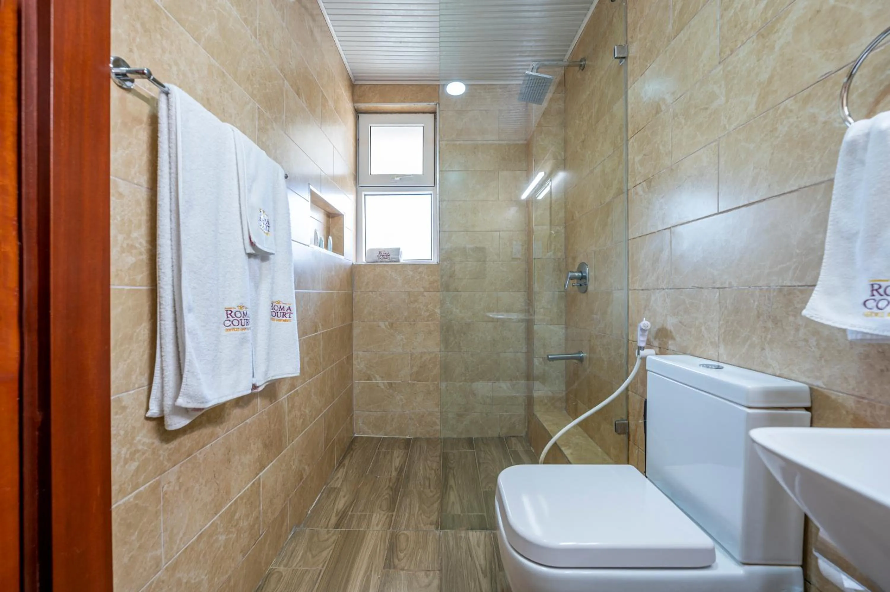 Toilet in Roma Court Serviced Apartments