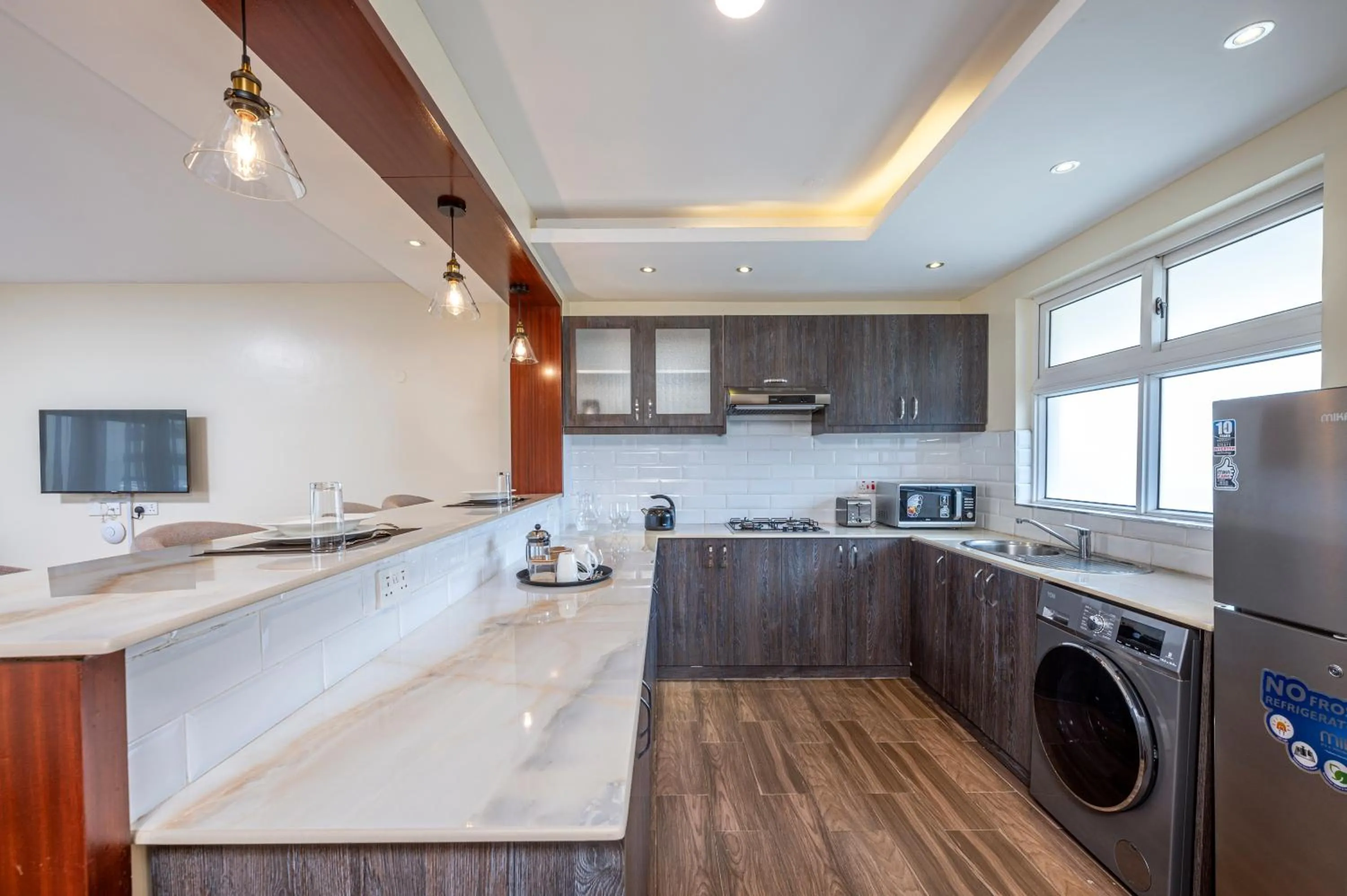 Kitchen or kitchenette in Roma Court Serviced Apartments