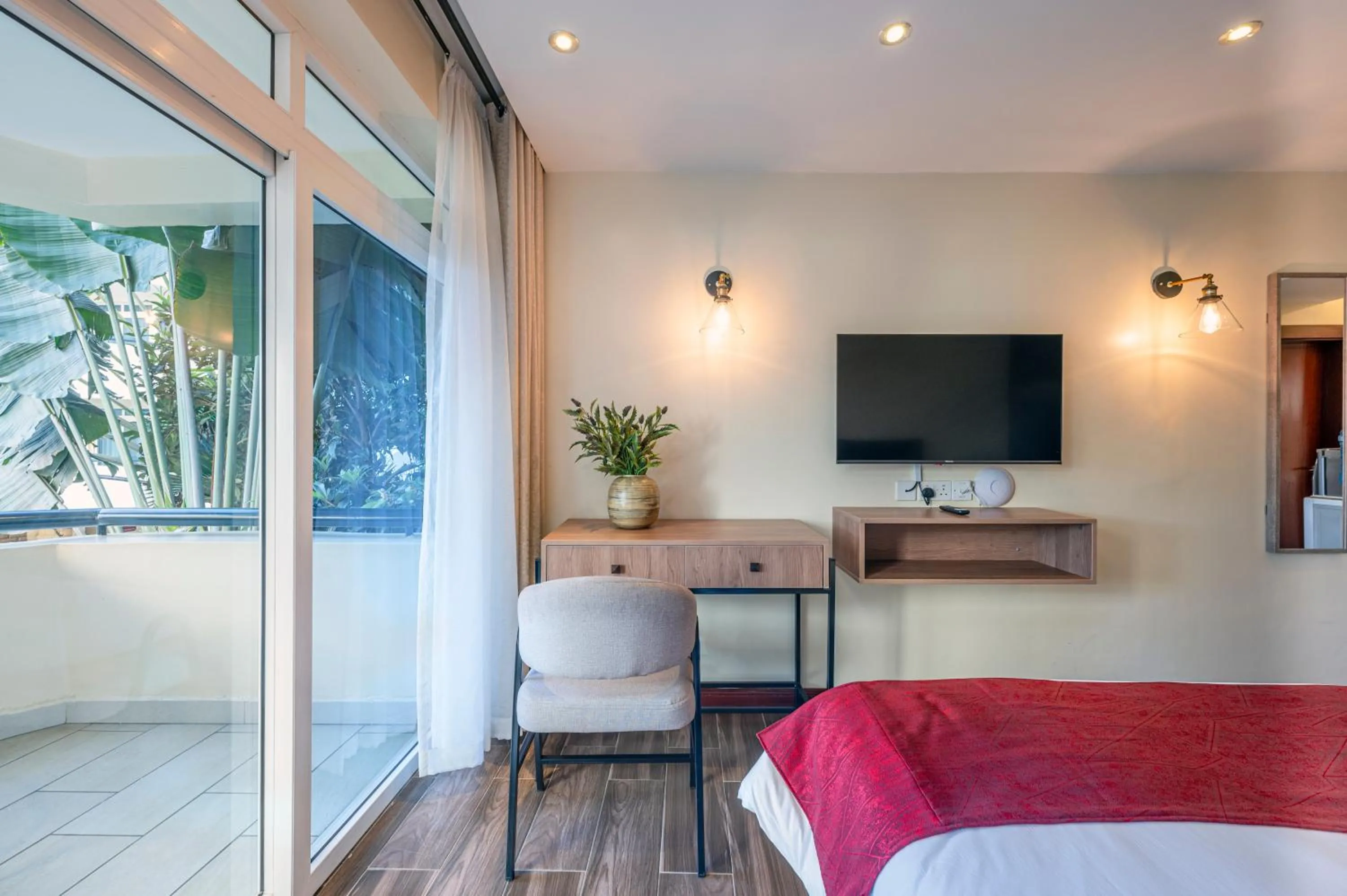 Seating area, Bed in Roma Court Serviced Apartments