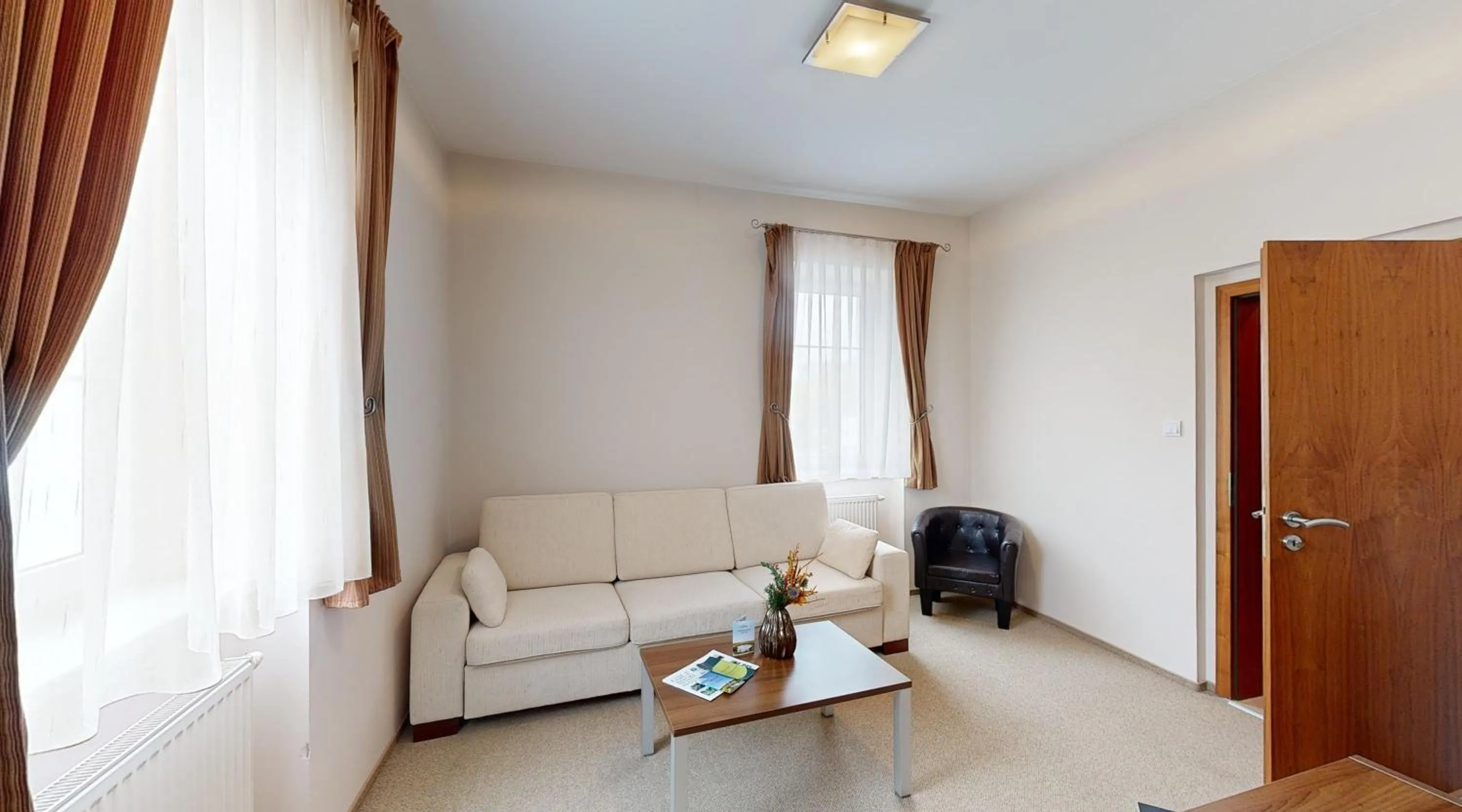 Seating area in Klaudia's Hotel & Restaurant at Golf Resort, Bač Šamorín