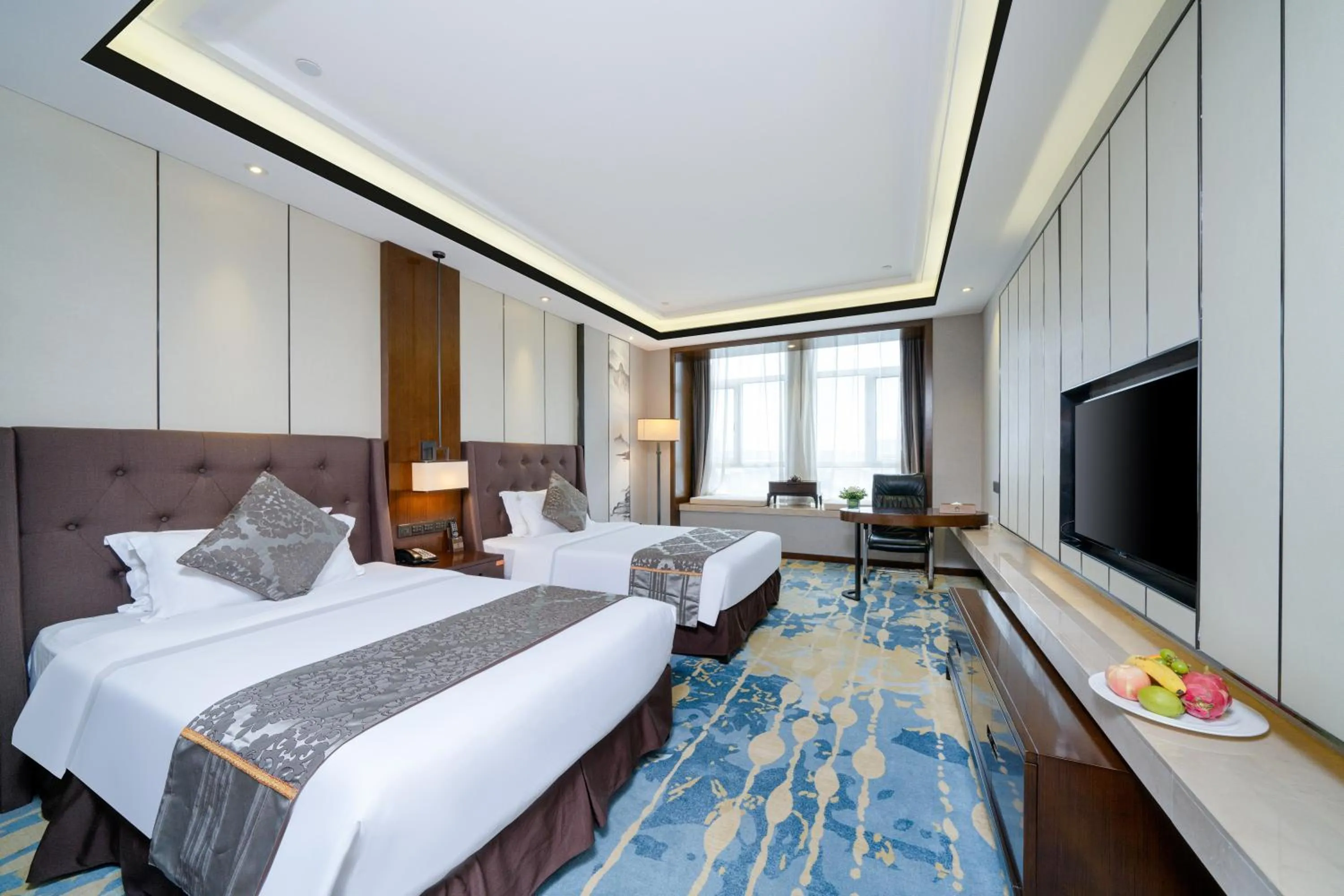 Bed in ME Yinhe International Hotel