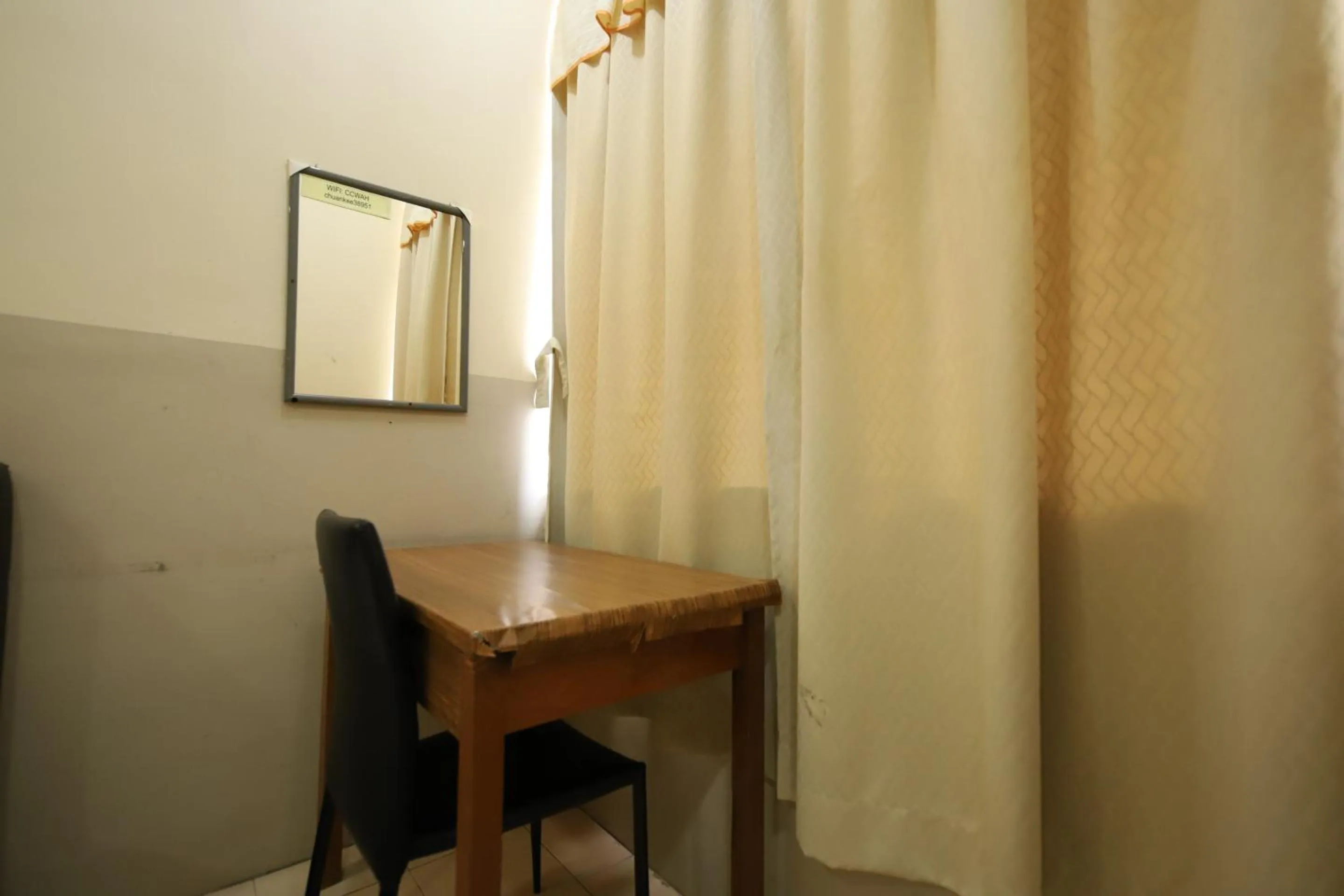 Bedroom in OYO Homes 90575 CK Bahau Homestay