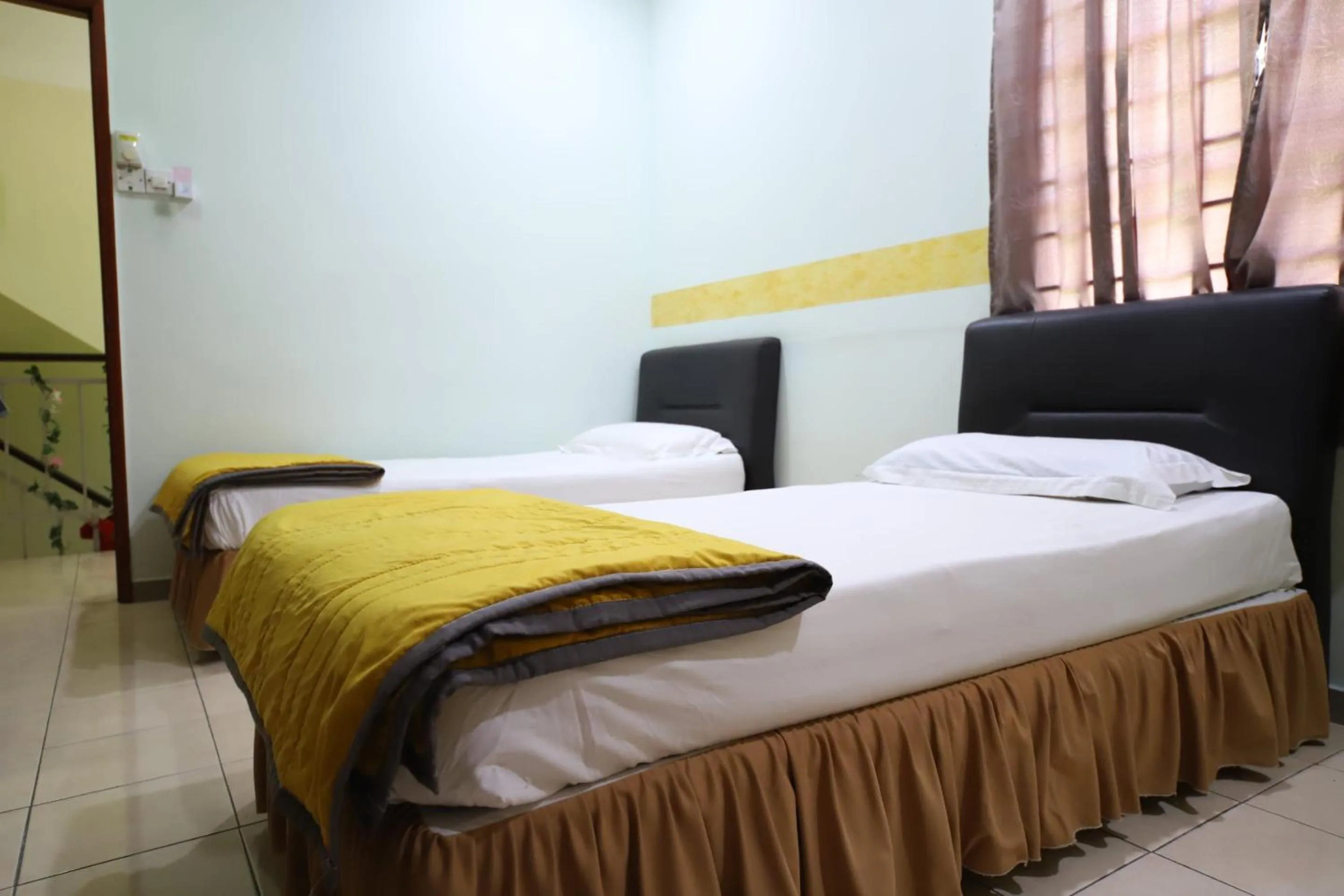Bedroom, Bed in OYO Homes 90575 CK Bahau Homestay