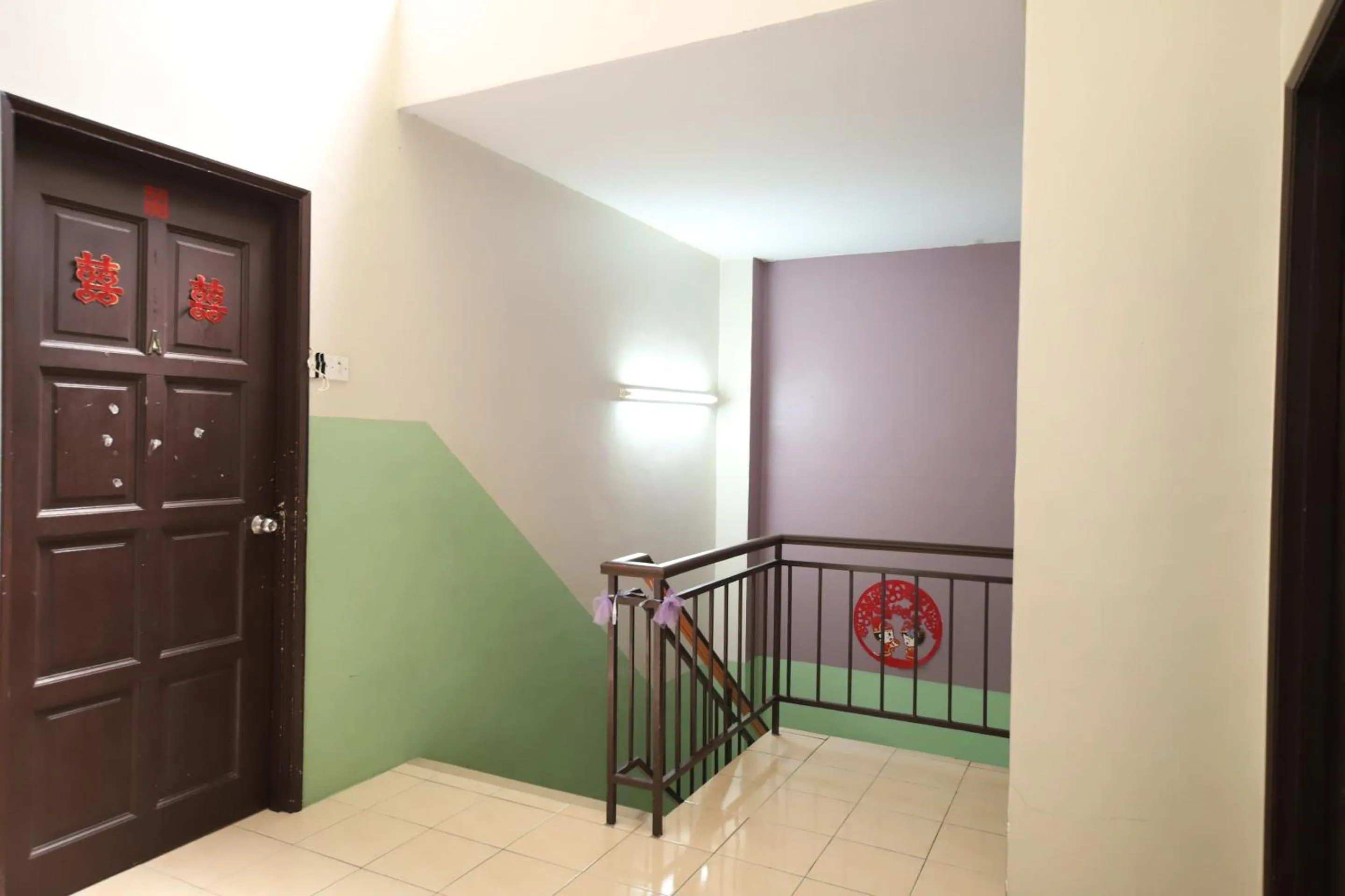 Bedroom in OYO Homes 90575 CK Bahau Homestay