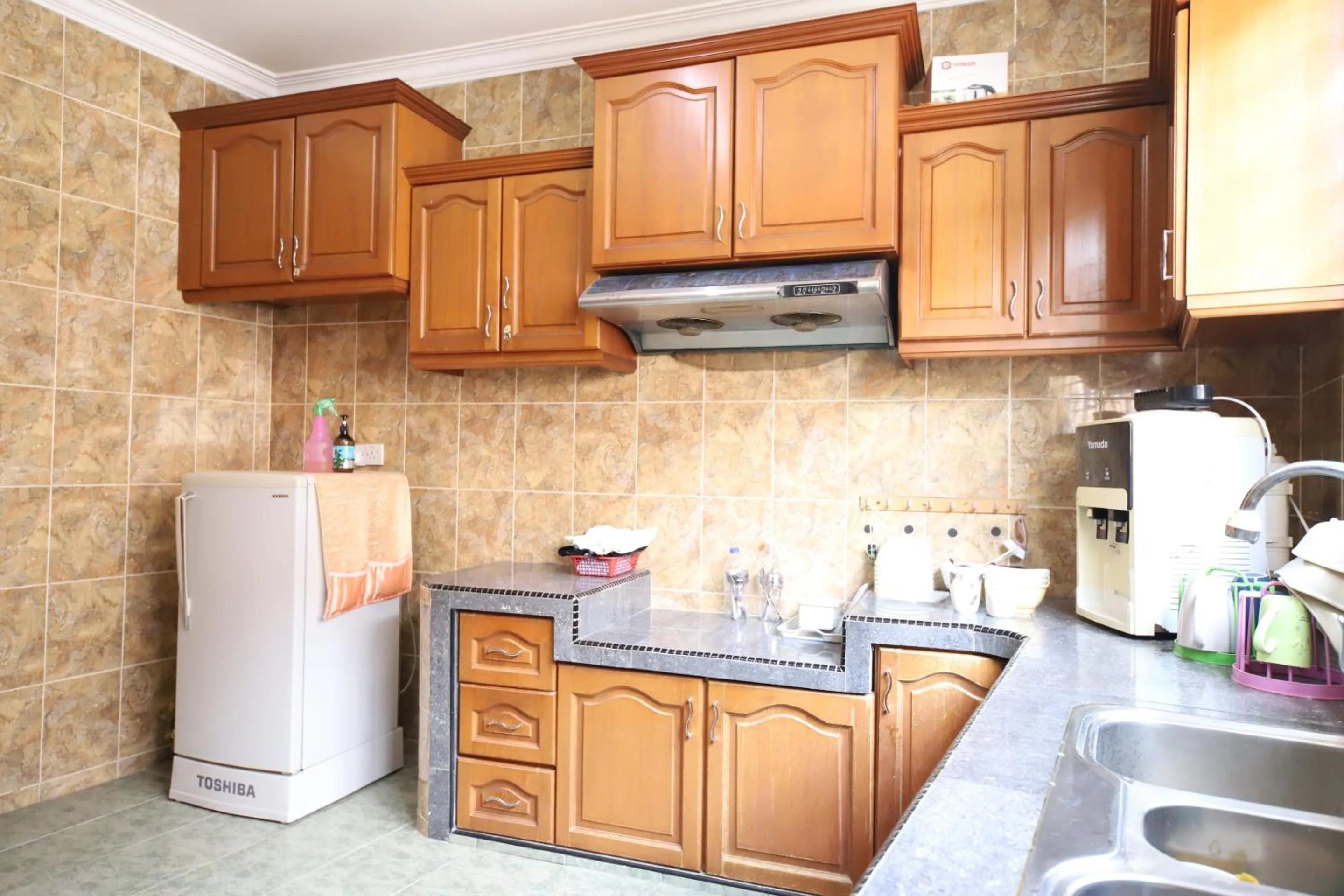 Kitchen or kitchenette in OYO Homes 90575 CK Bahau Homestay