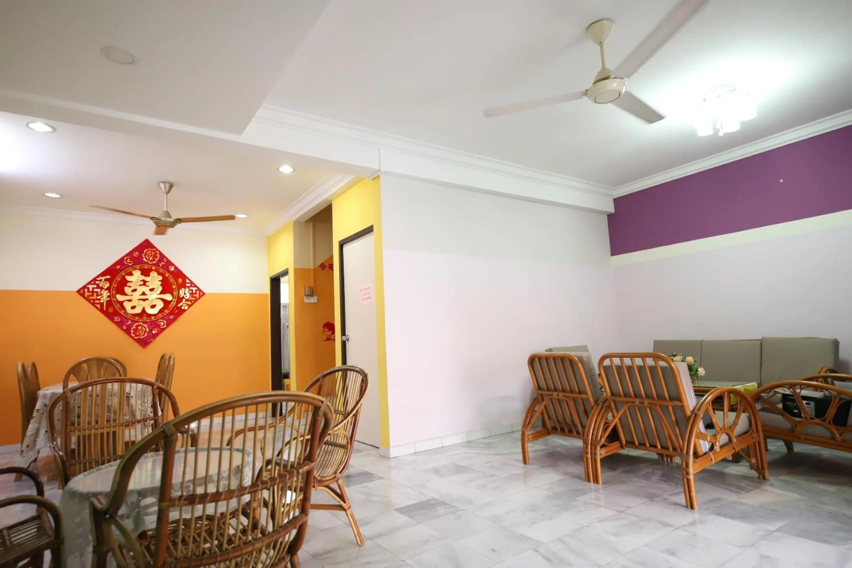 Dining area in OYO Homes 90575 CK Bahau Homestay