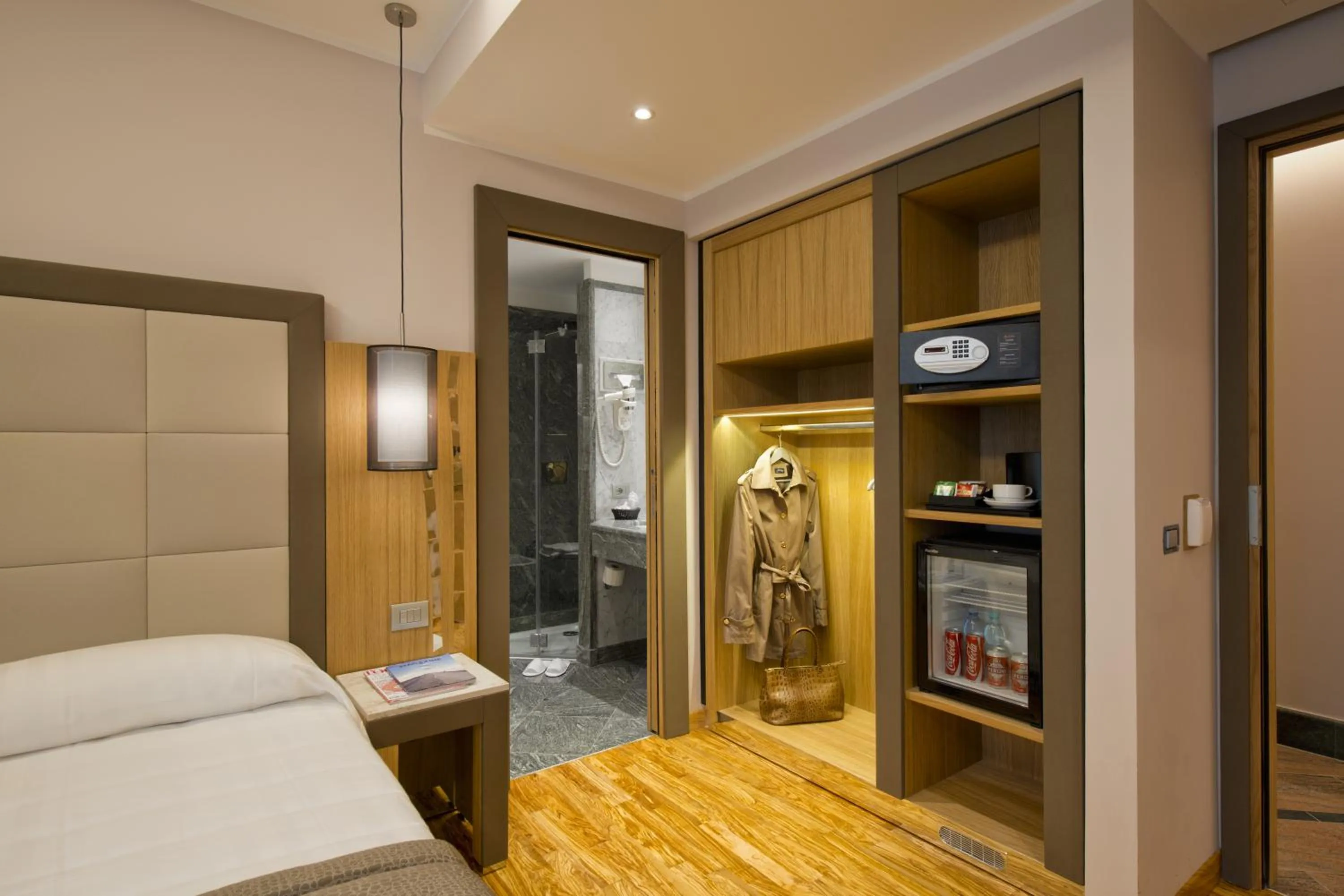 Decorative detail, Bed in Hotel Giolli Nazionale