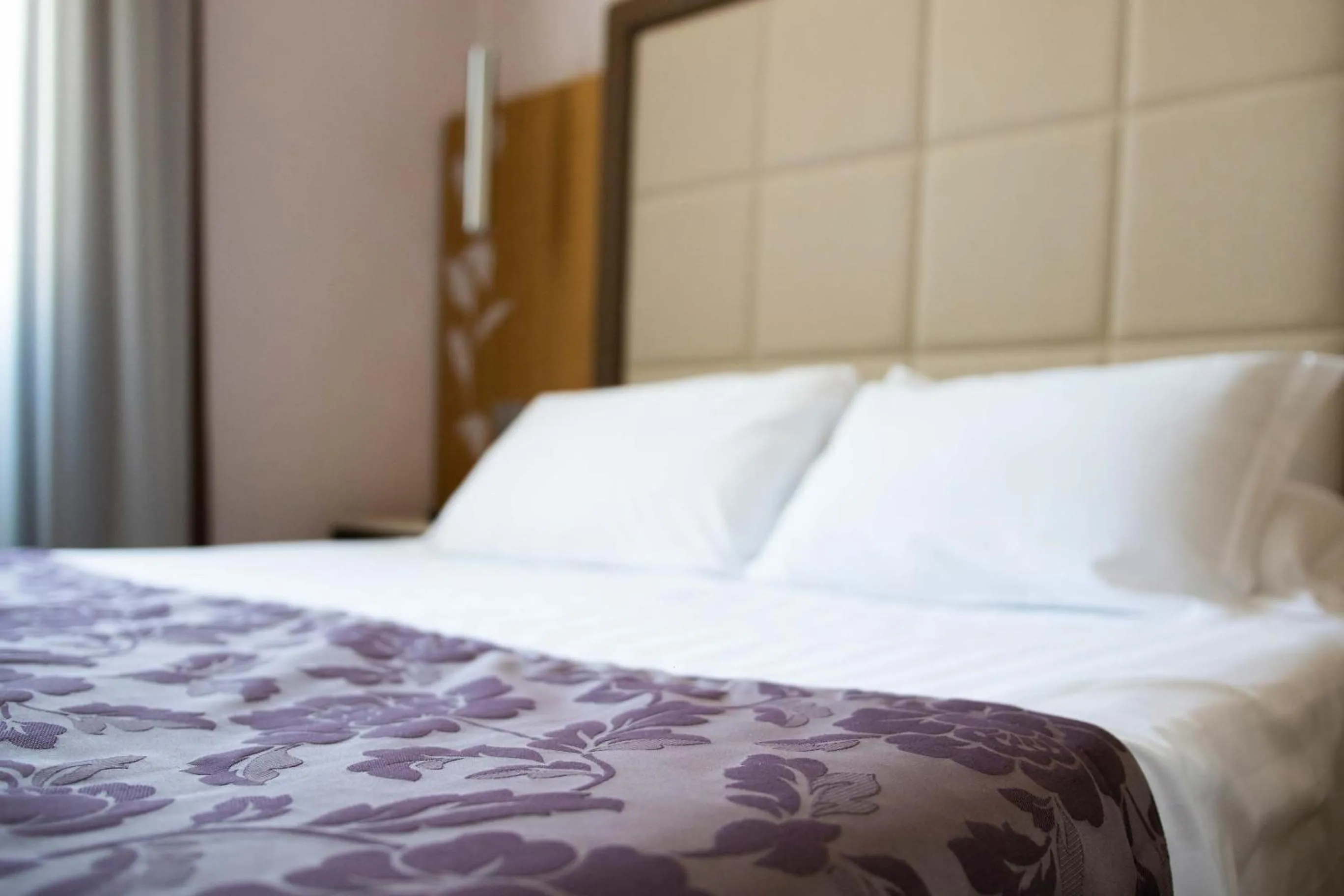 Bed in Hotel Giolli Nazionale