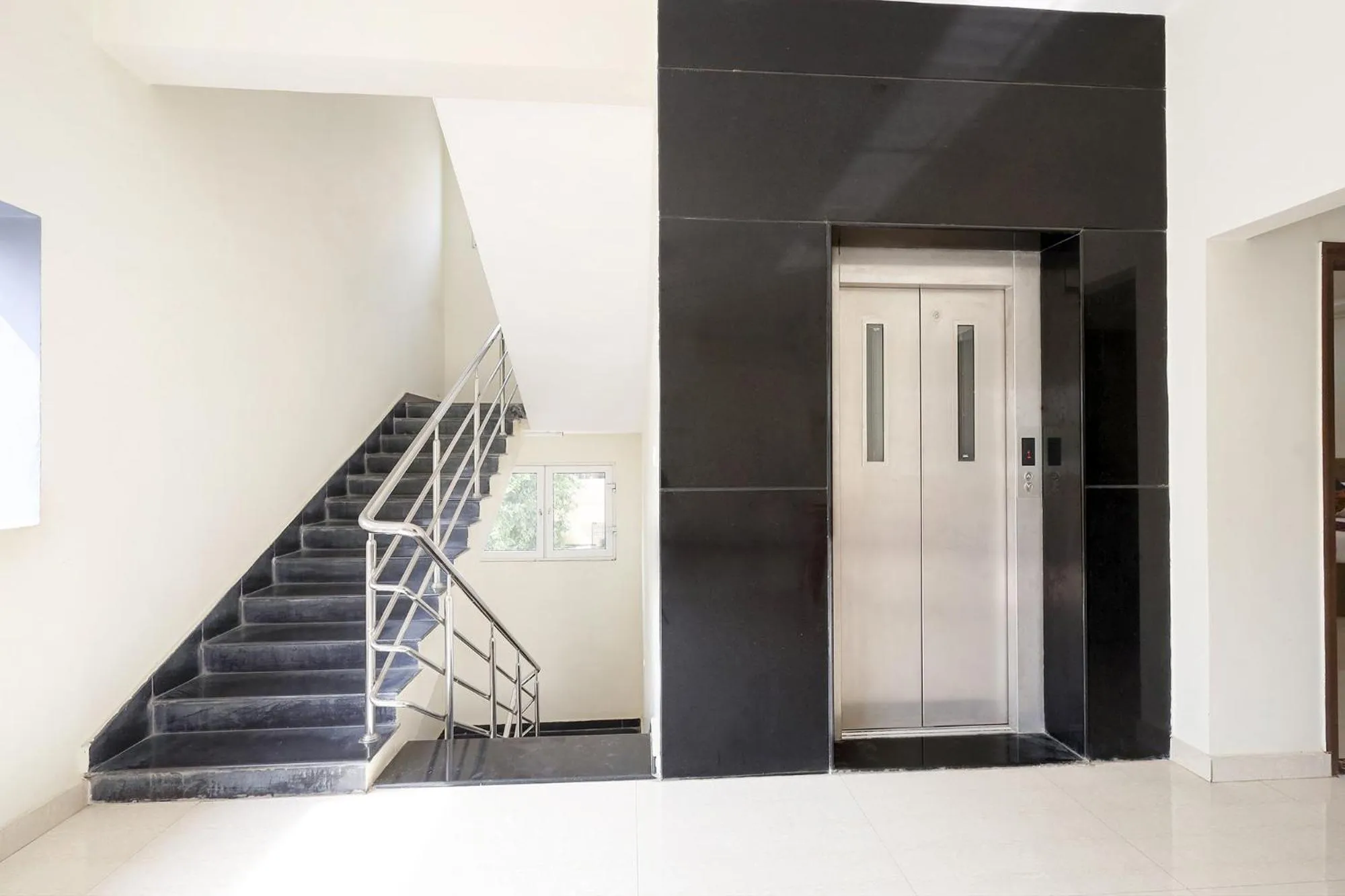 elevator in FabHotel Karthikeya Residency - 900m from Tirupati Bus Stand