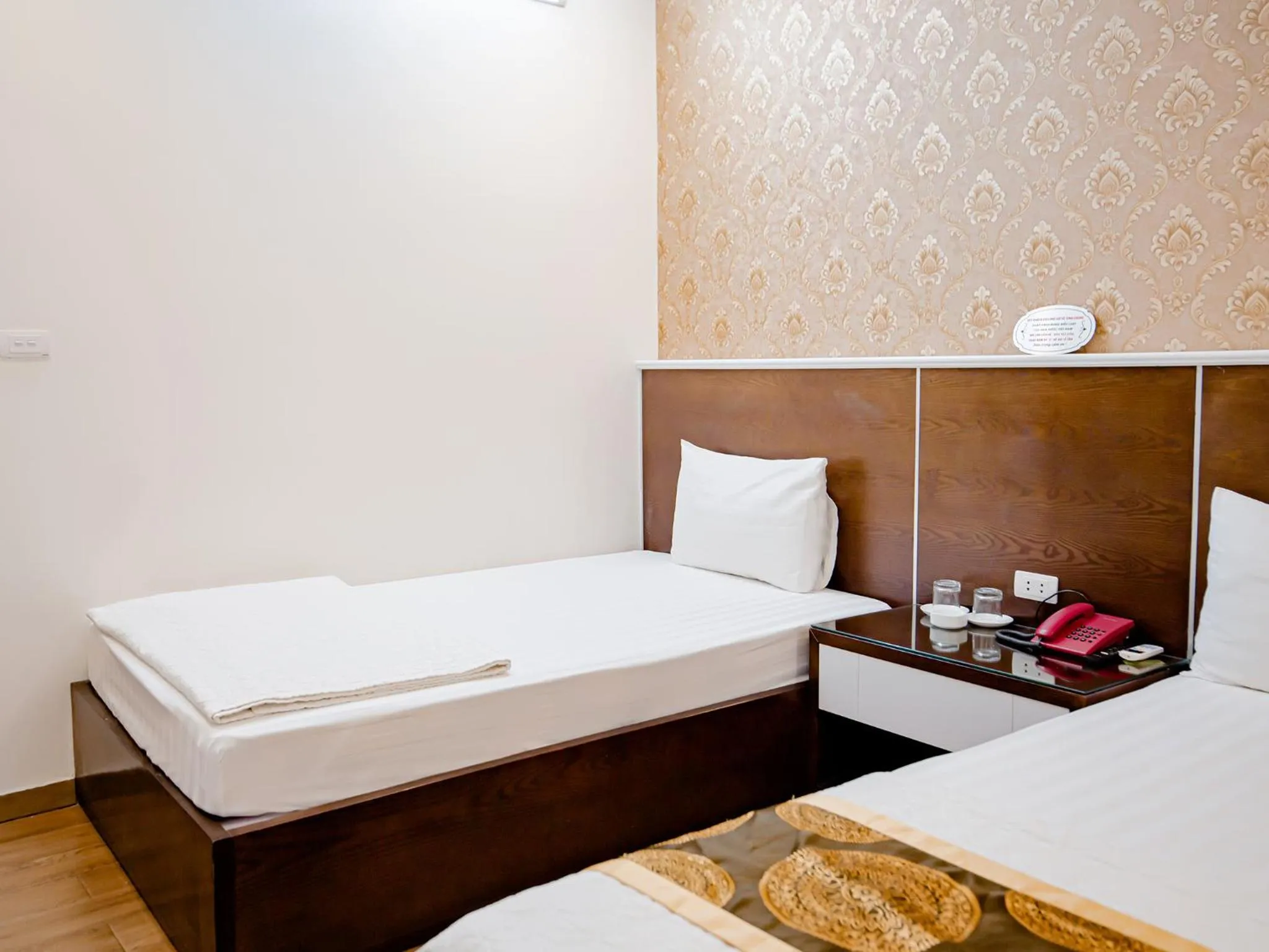 Bed in Phuong Nam Luxury Hotel Long Bien