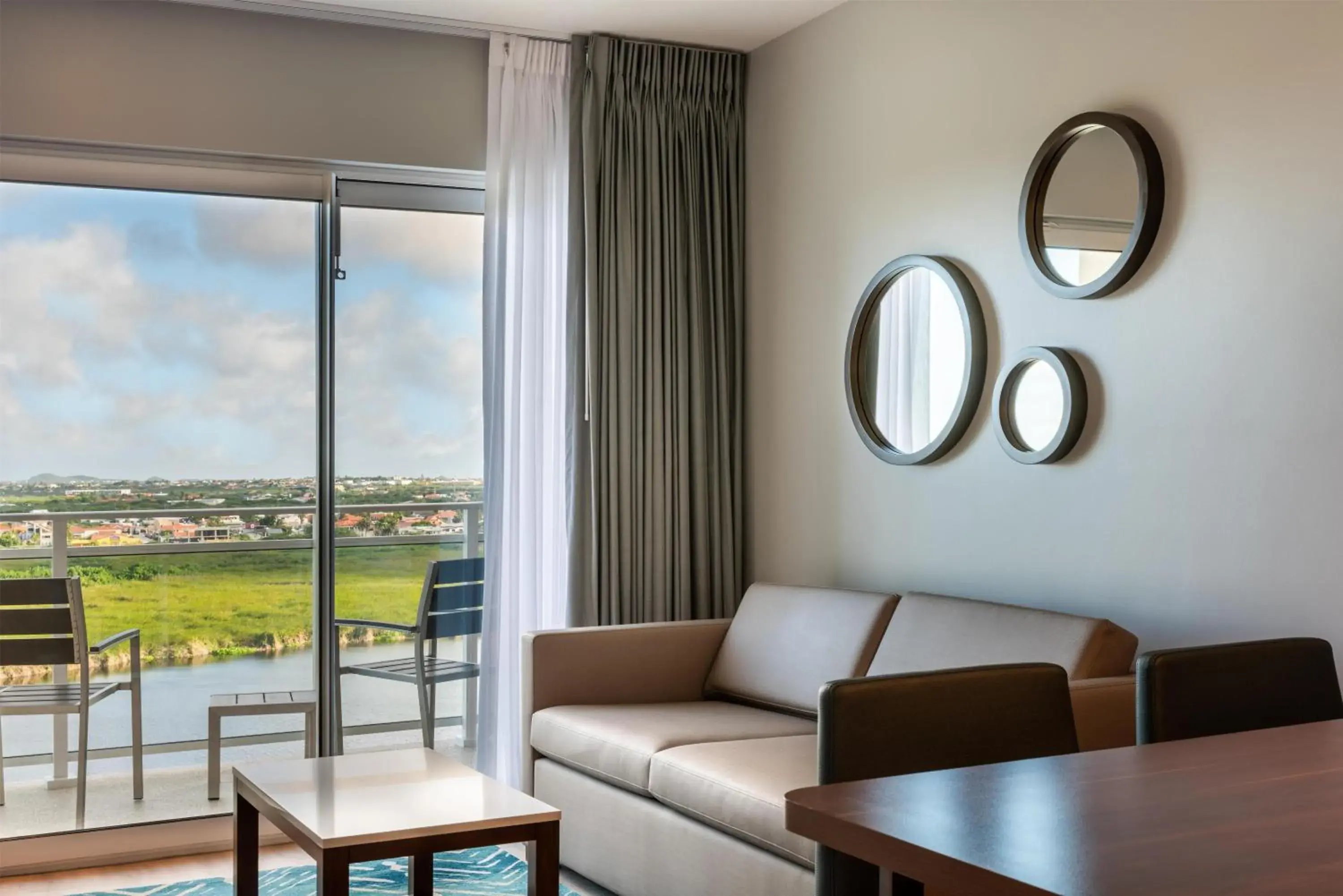 One-Bedroom King Suite with Roll-In Shower - Disability Access in Embassy Suites By Hilton Aruba Beach Resort One-Bedroom King Suite with Roll-In Shower - Disability Access in Embassy Suites By Hilton Aruba Beach Resort