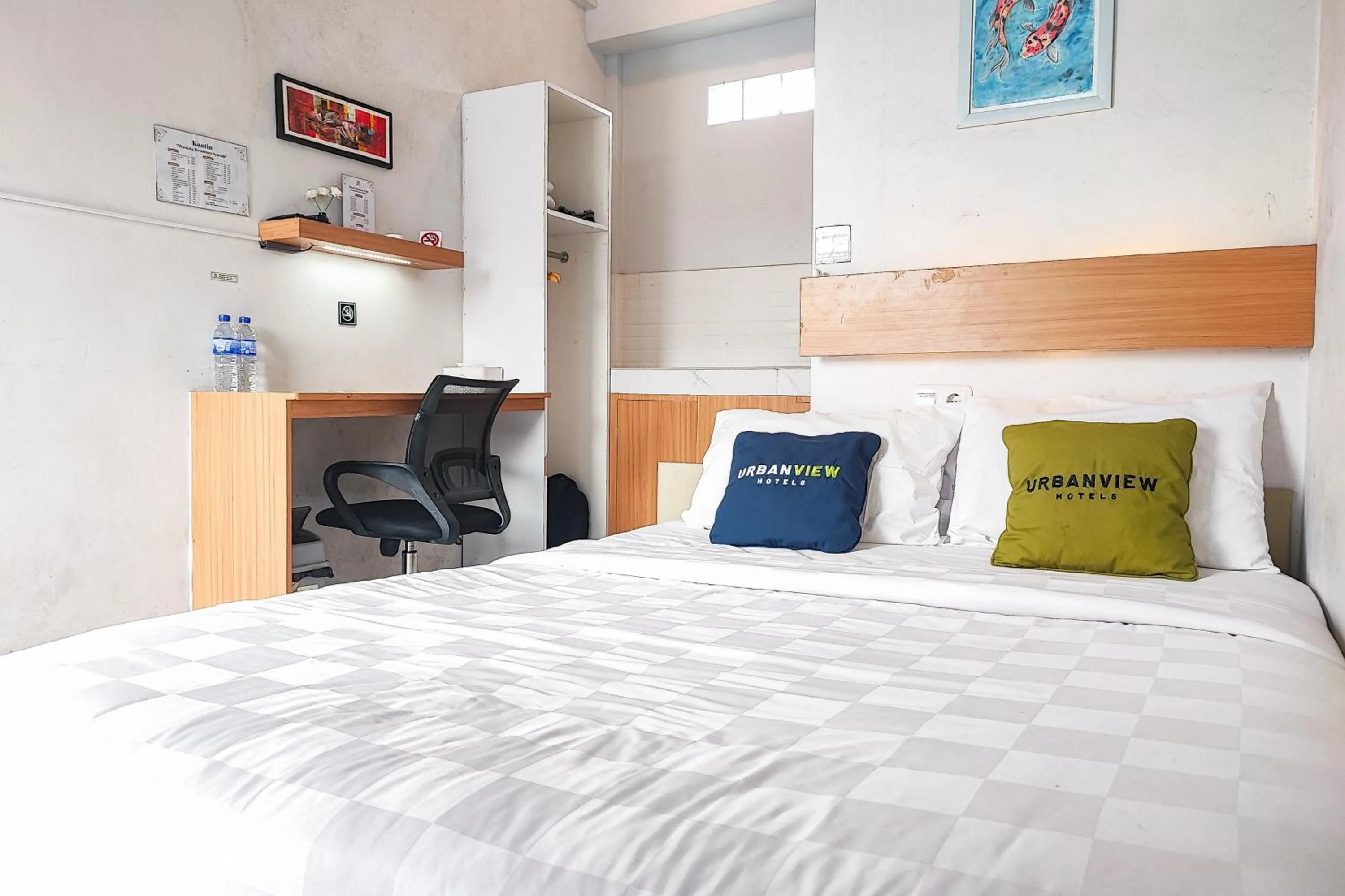 Bedroom, Bed in Urbanview Hotel Syariah at Waskita Residence Telanaipura