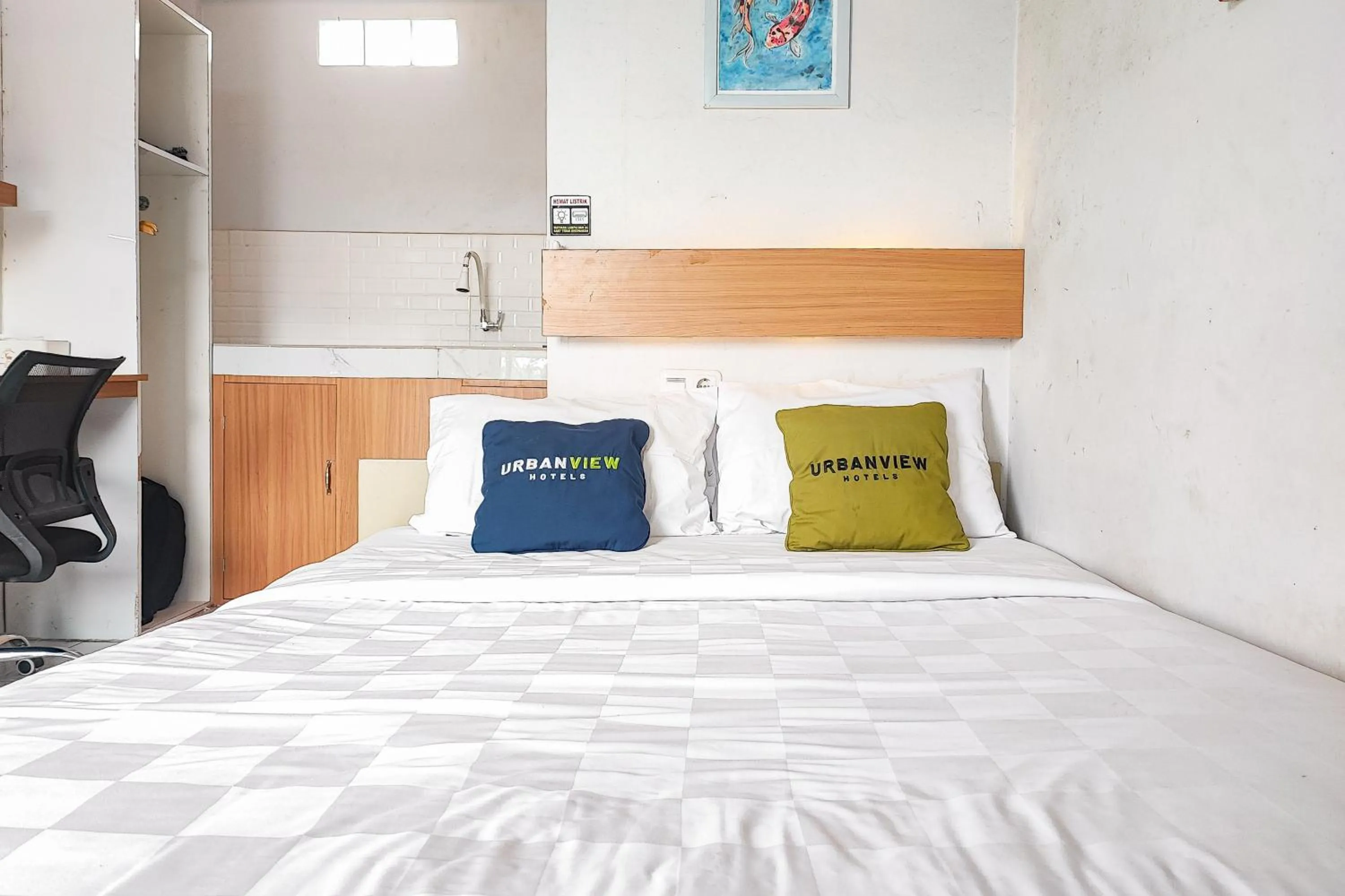 Bedroom, Bed in Urbanview Hotel Syariah at Waskita Residence Telanaipura