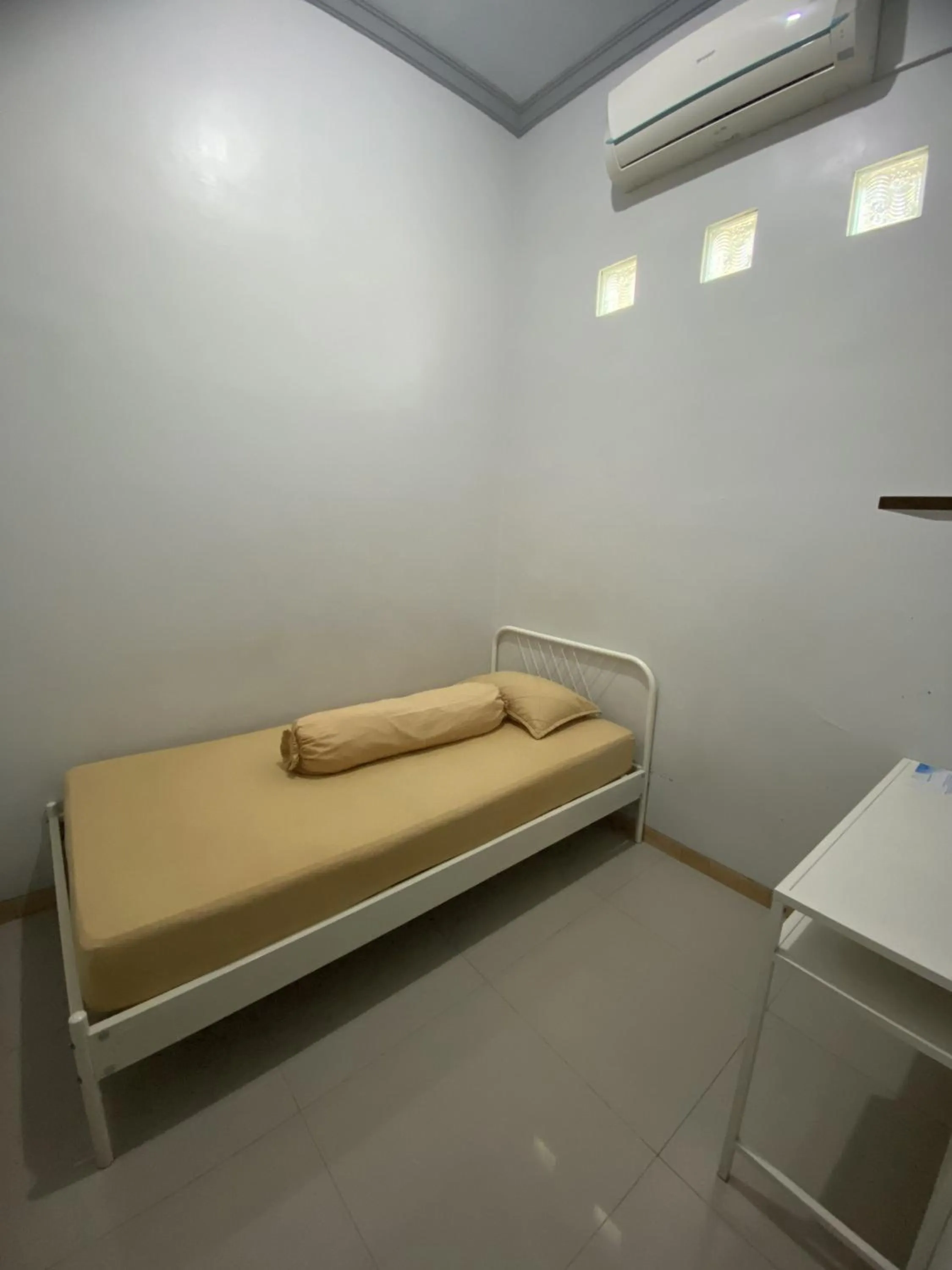 Bed in IB Homestay Syariah by Ecommerceloka