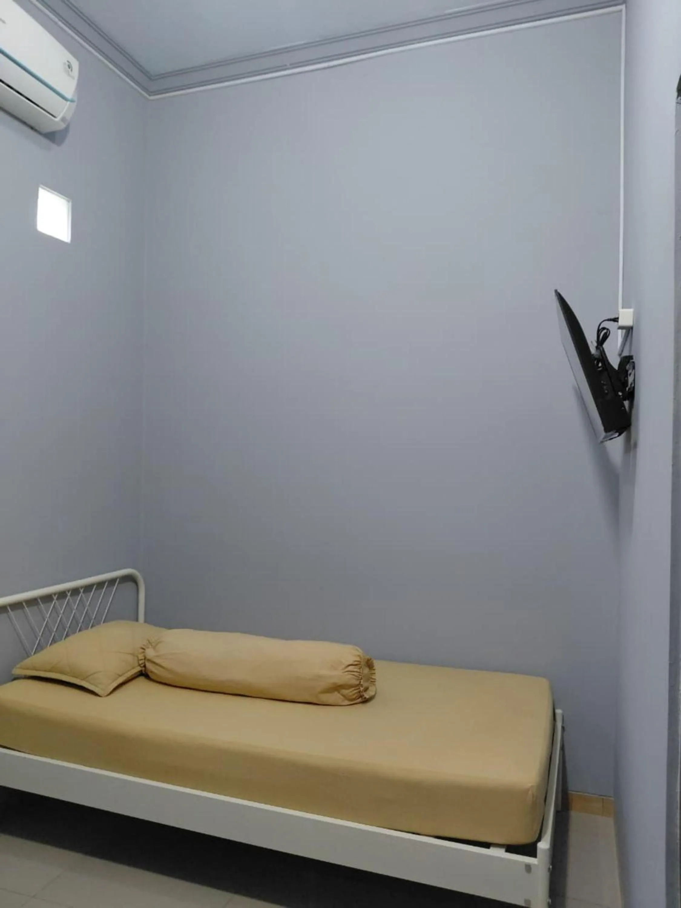 Bed in IB Homestay Syariah by Ecommerceloka