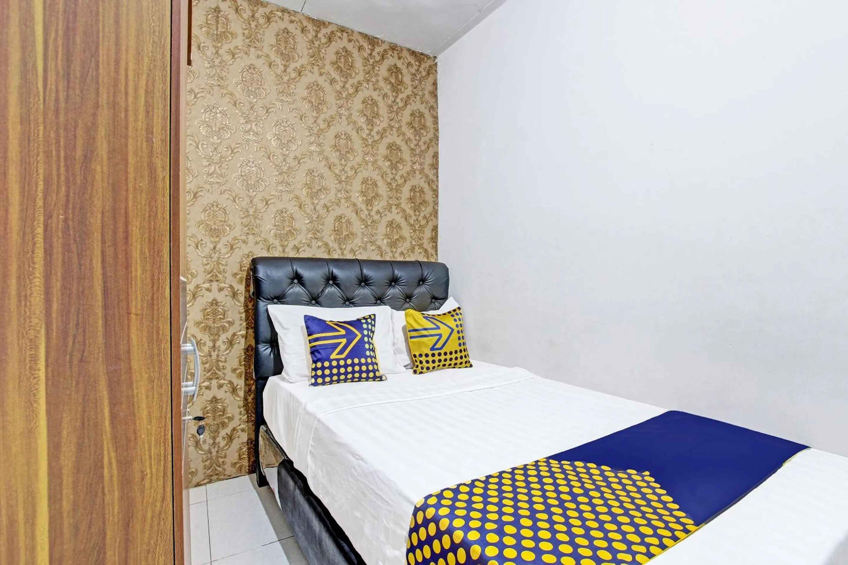 Bedroom, Bed in SPOT ON 91521 Mayong Guesthouse