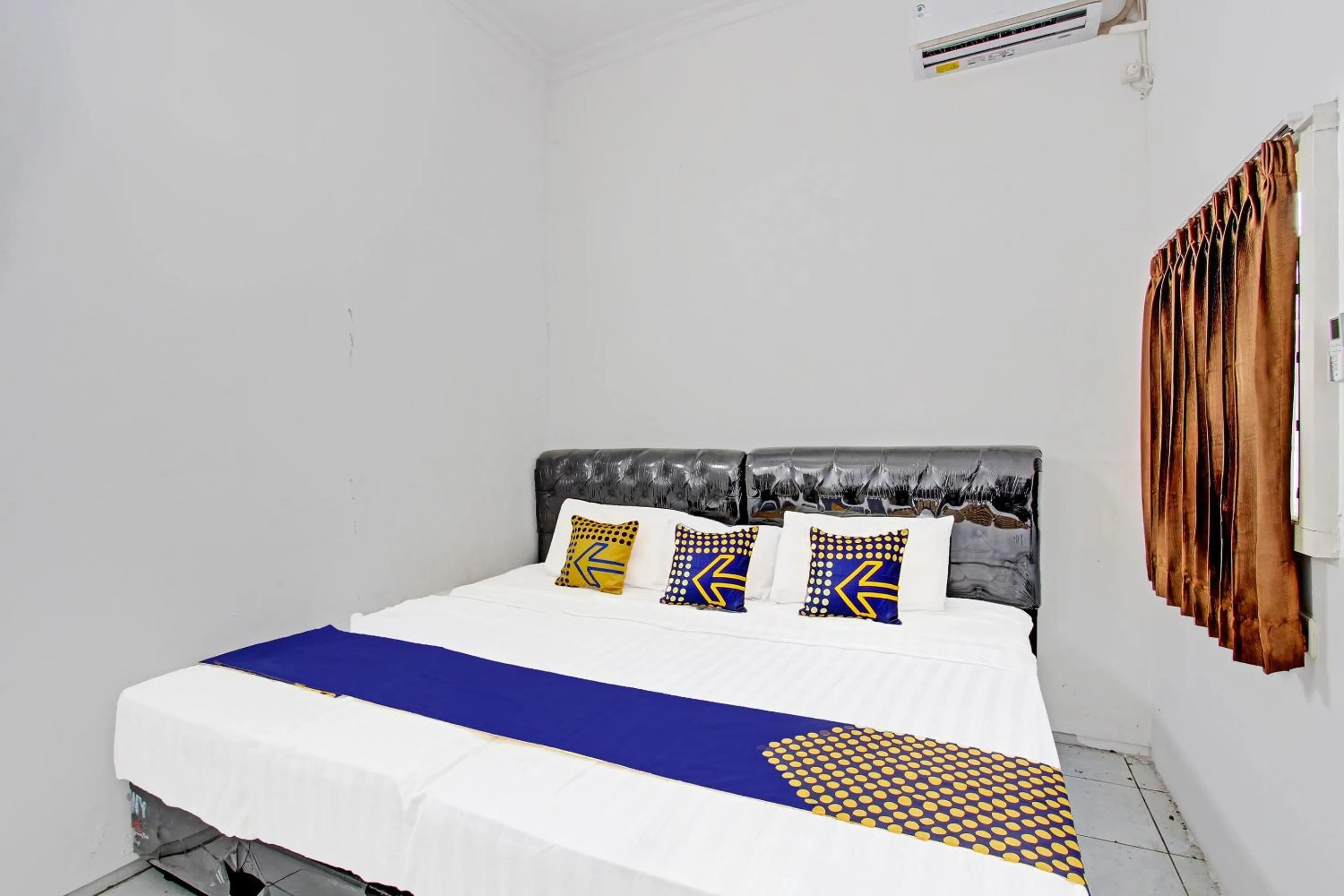 Bedroom in OYO Life 91523 Kenari Guesthouse