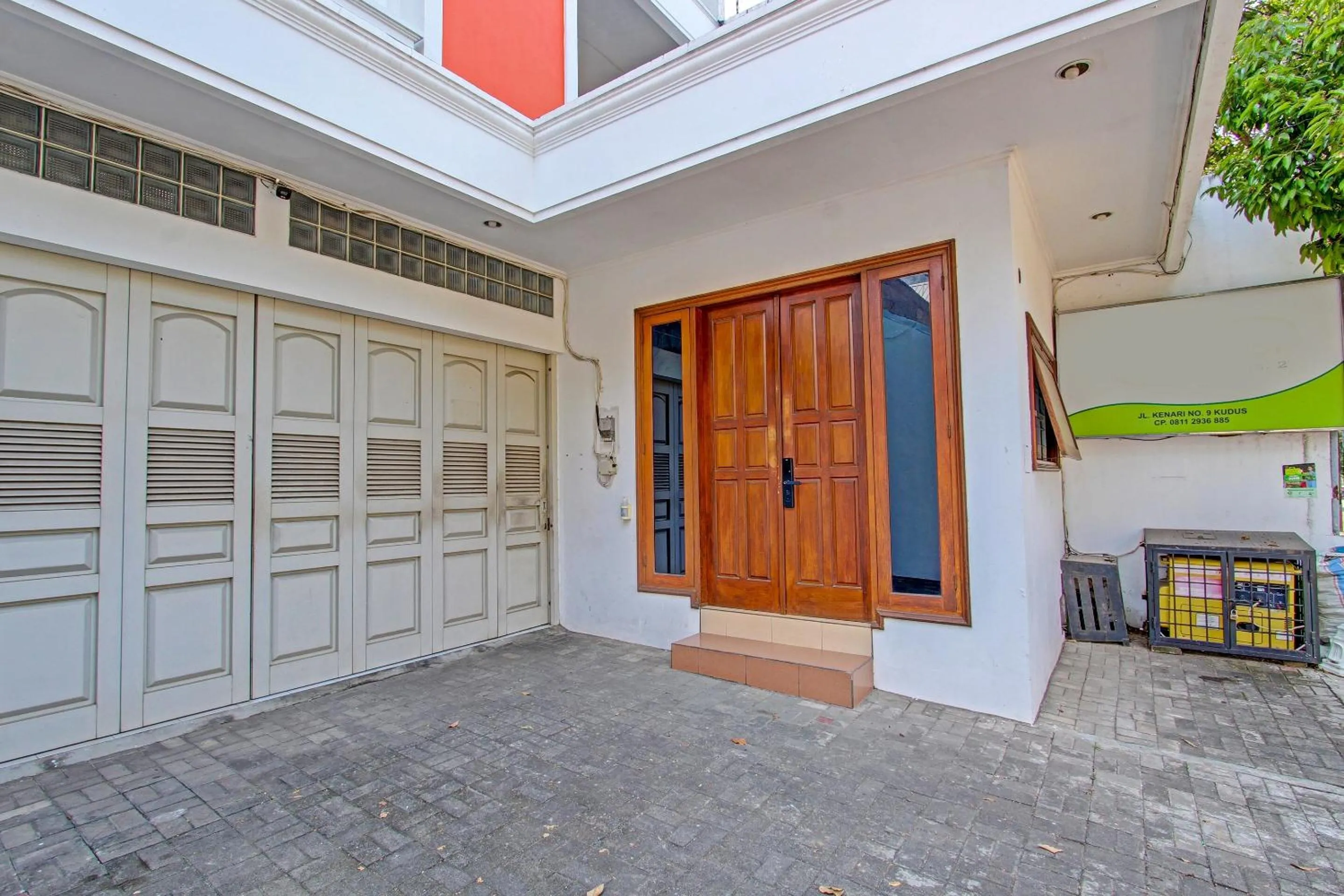 Facade/entrance in OYO Life 91523 Kenari Guesthouse