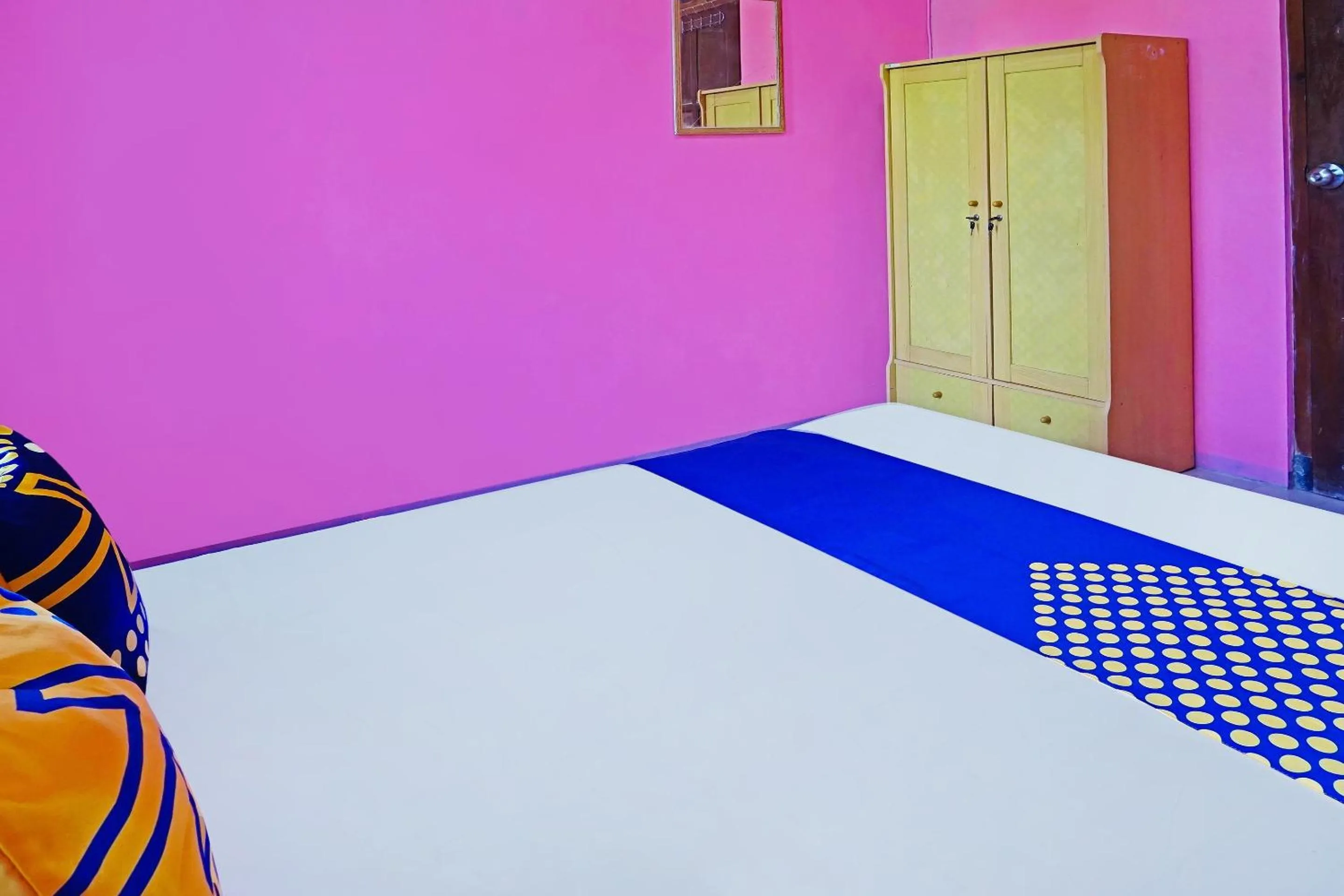 Bedroom in SPOT ON 91527 As-sakinah Homestay Syariah