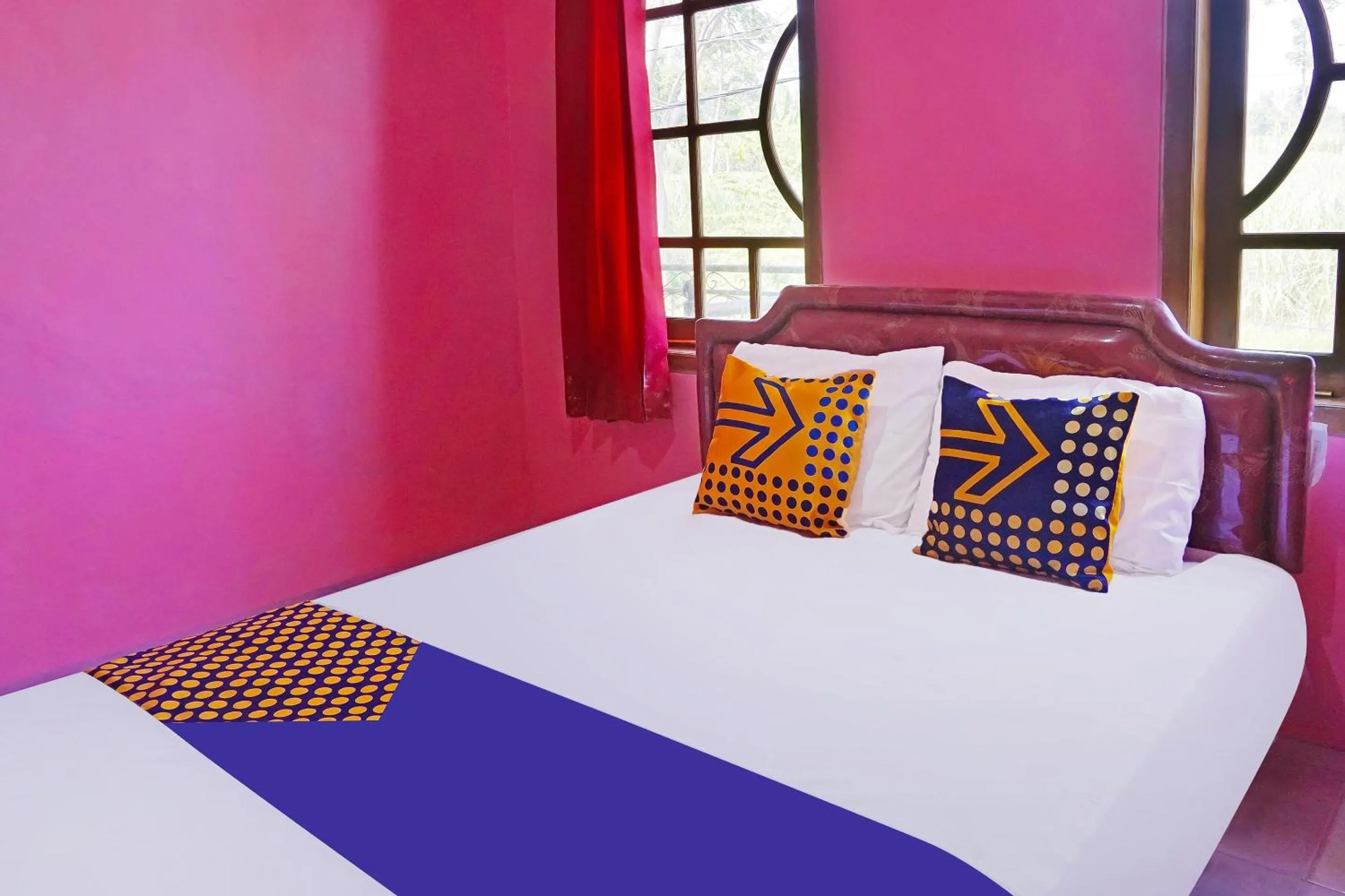 Bedroom in SPOT ON 91527 As-sakinah Homestay Syariah